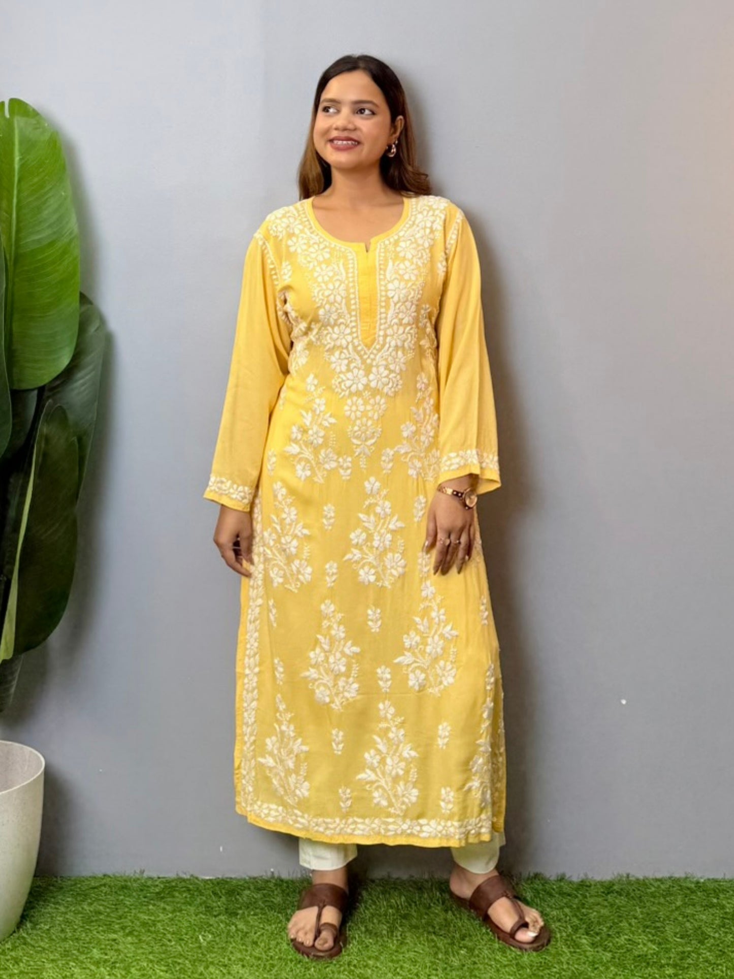 Sunshine yellow modal chikankari kurta with white floral hand embroidery on front and sleeves