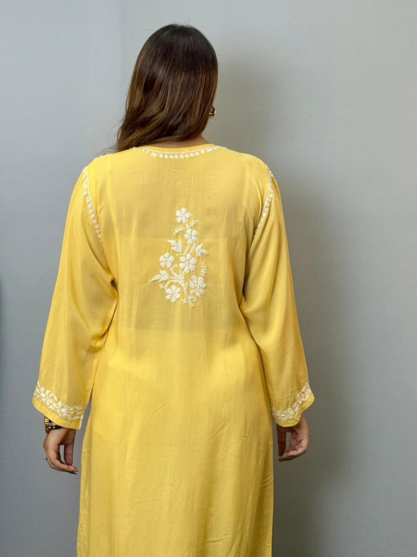 Sunshine yellow modal chikankari kurta with white floral hand embroidery on front and sleeves