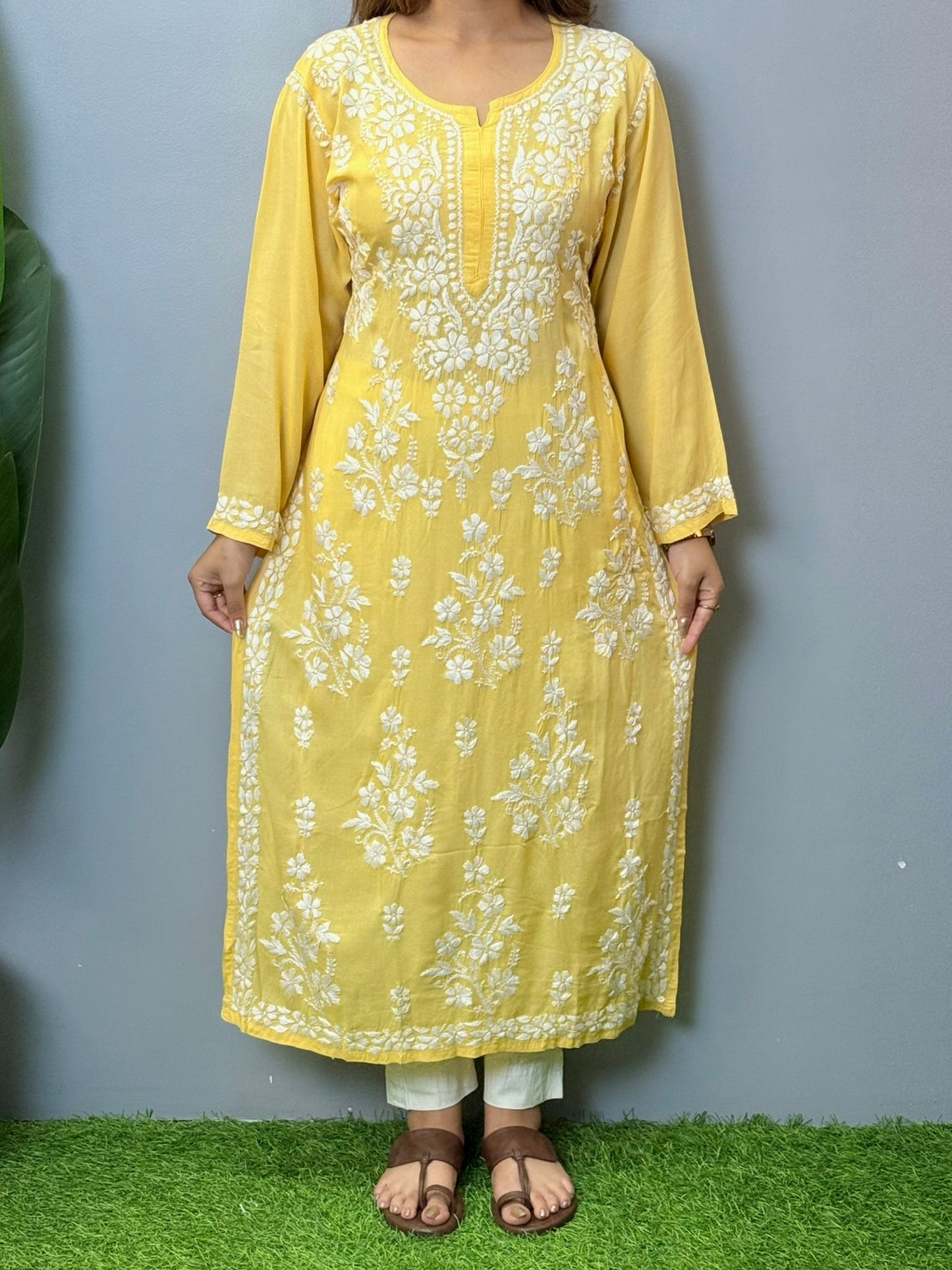 Sunshine yellow modal chikankari kurta with white floral hand embroidery on front and sleeves