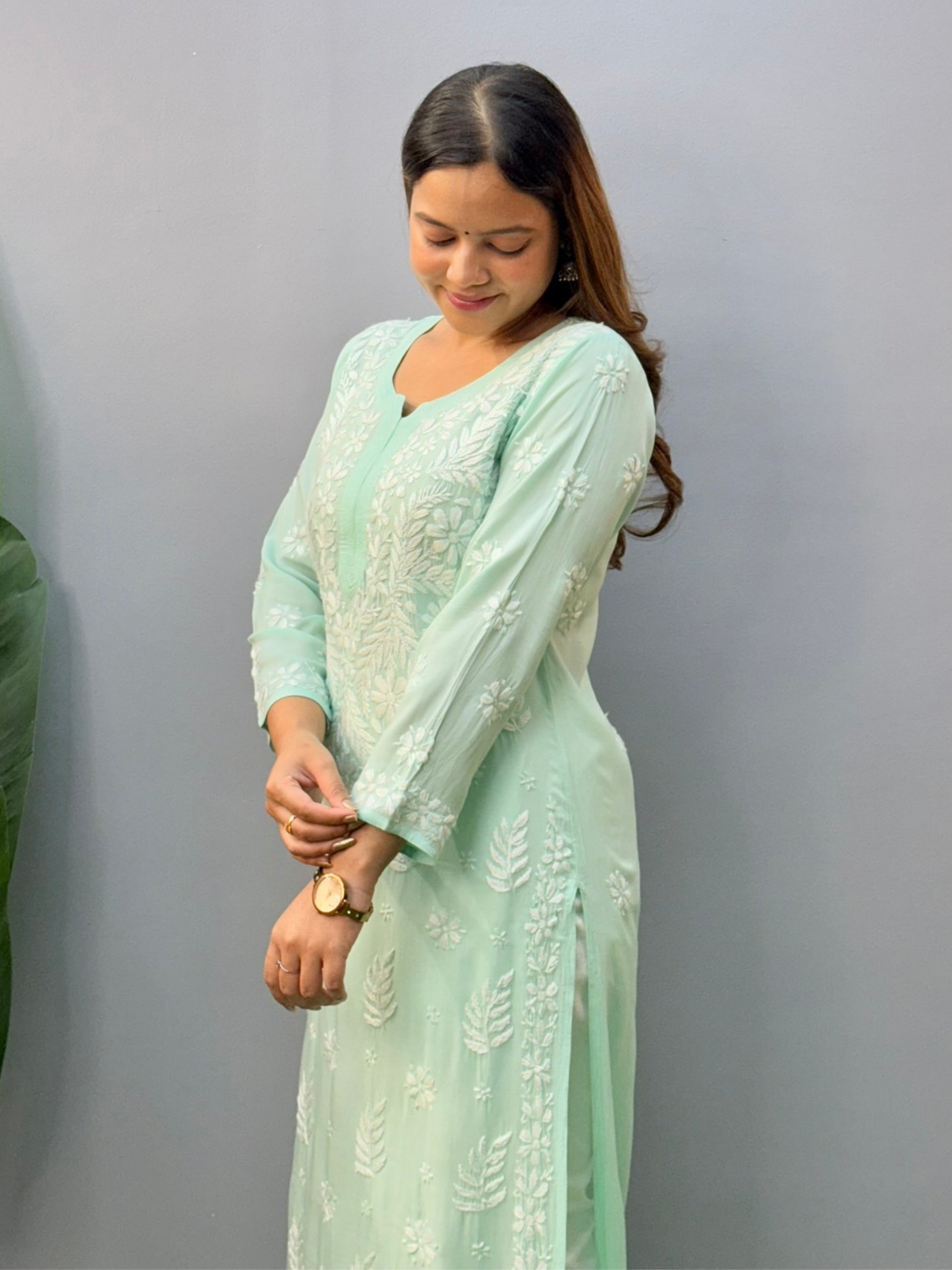 Mint green modal fabric chikankari kurta with white floral hand embroidery, straight long kurti for women
