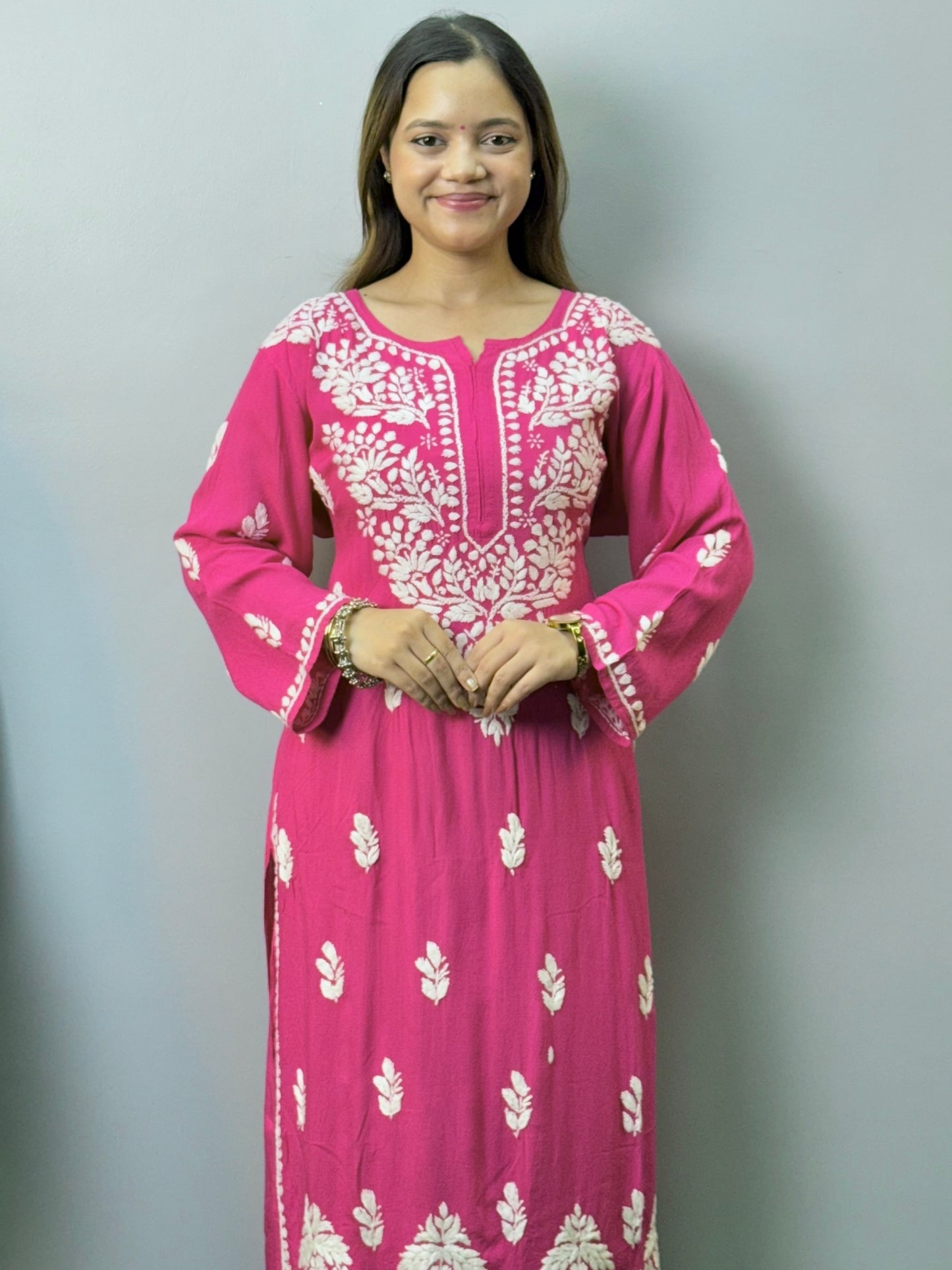 Rani pink rayon Lucknow Chikankari kurta with white hand embroidery and matching palazzo set