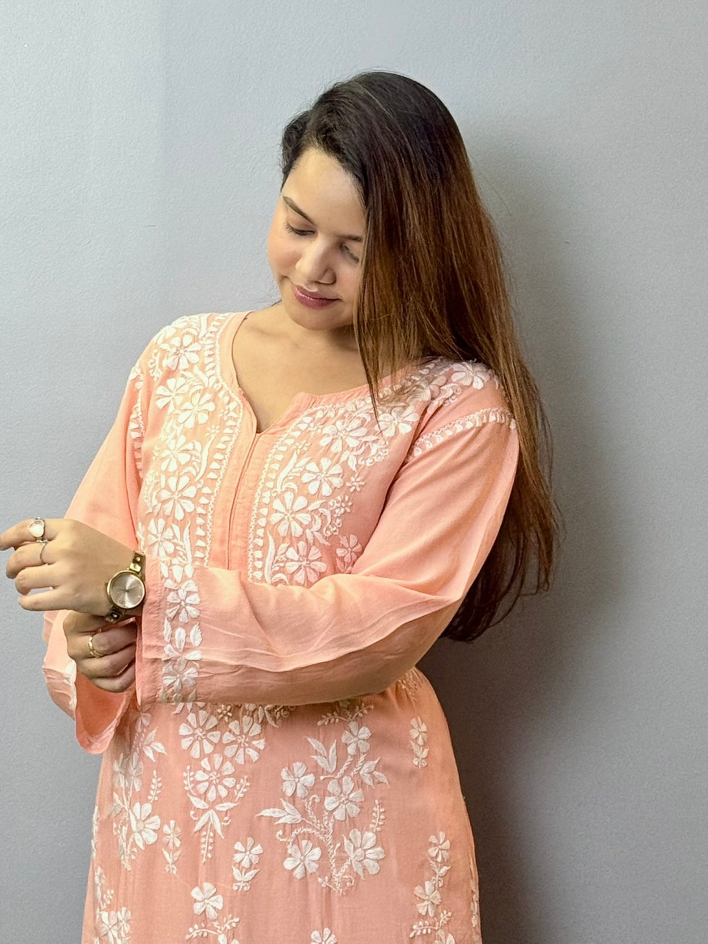 Peach modal Chikankari kurta with intricate white hand embroidery