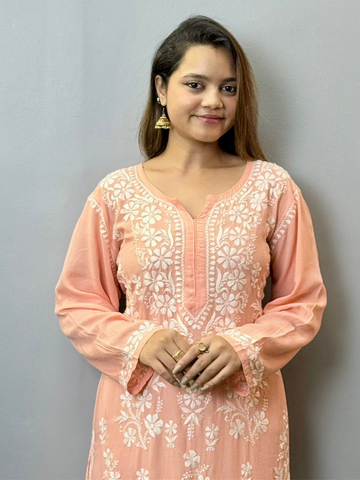 Peach modal Chikankari kurta with intricate white hand embroidery