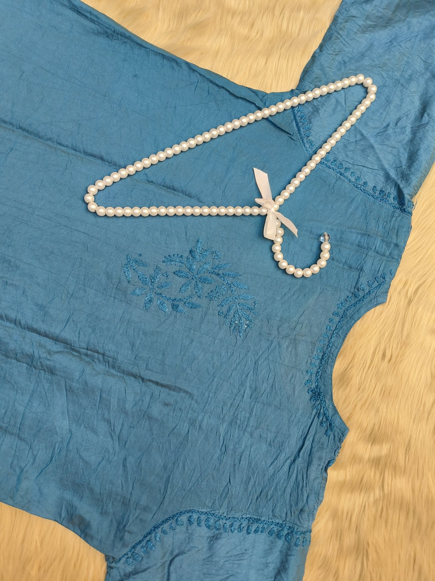 Peacock blue chanderi chikankari kurta with detailed hand embroidery and lace finish