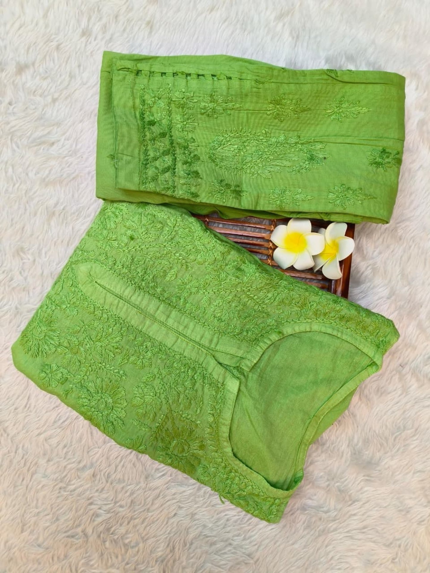 Green chanderi Lucknow Chikankari kurta with cotton lycra stretchable pants, featuring hand embroidery.