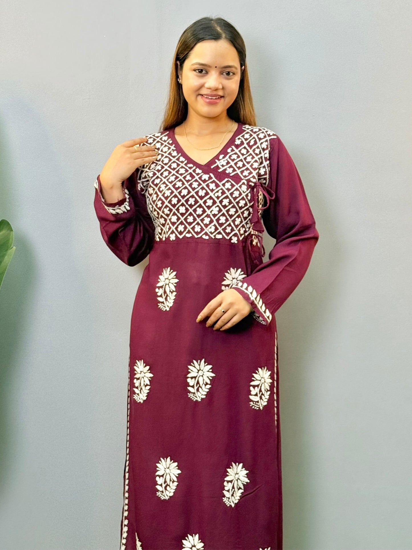 Wine color angrakha-style Lucknow Chikankari kurta with white floral embroidery and side tie-ups