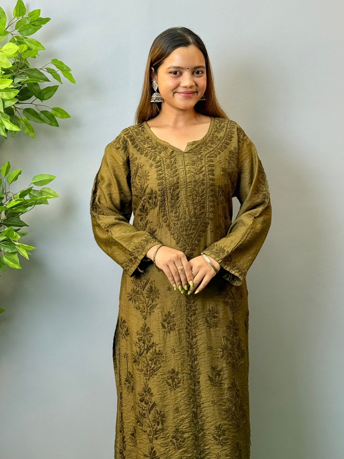 Woman wearing olive brown chanderi chikankari kurta with tone-on-tone embroidery