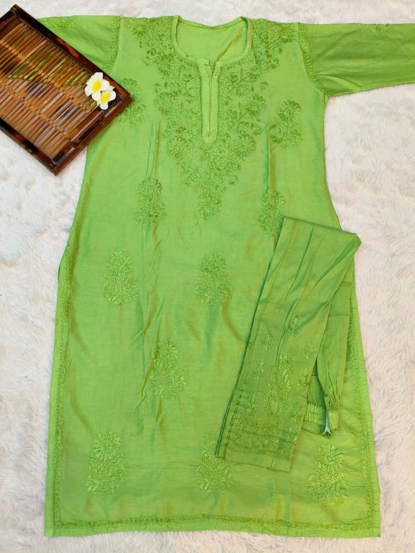 Green chanderi Lucknow Chikankari kurta with cotton lycra stretchable pants, featuring hand embroidery.