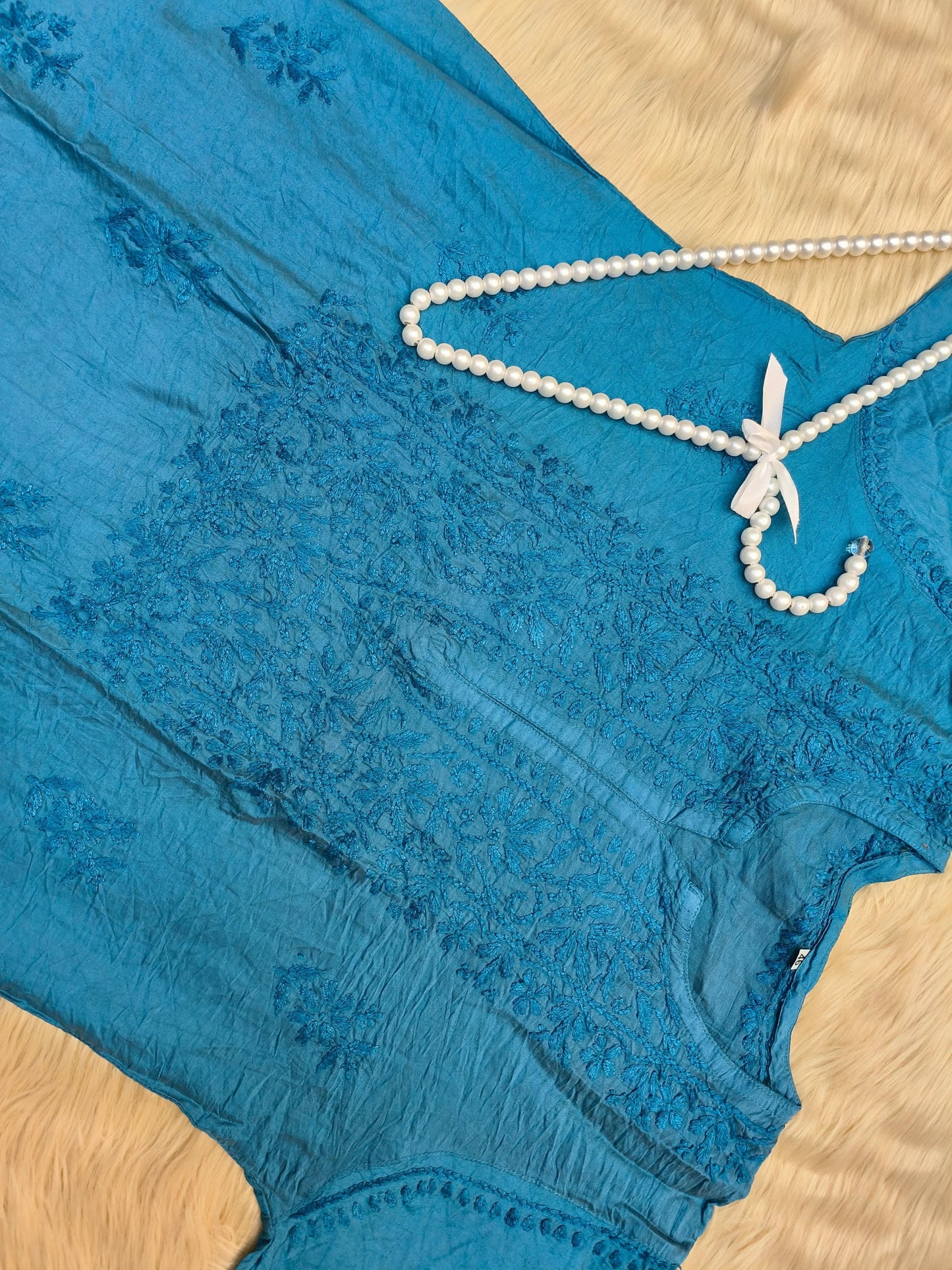 Peacock blue chanderi chikankari kurta with detailed hand embroidery and lace finish
