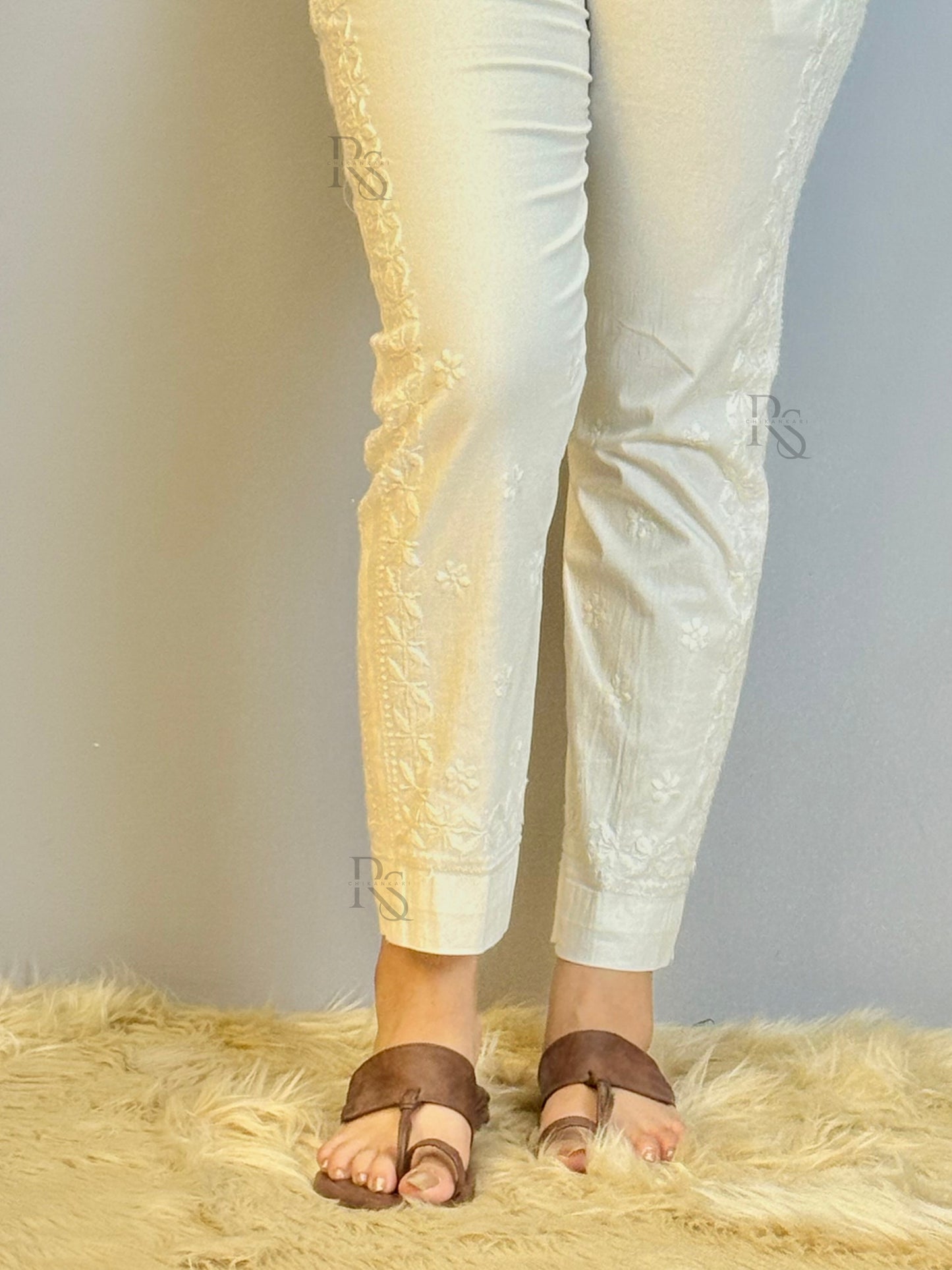 Stretchable white cotton pant with heavy side Chikankari hand embroidery