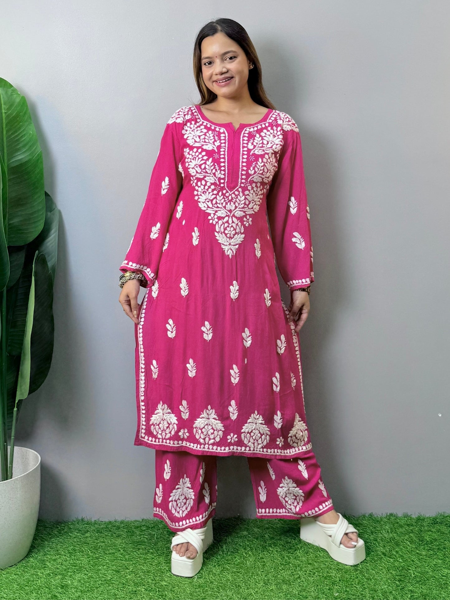 Rani pink rayon Lucknow Chikankari kurta with white hand embroidery and matching palazzo set