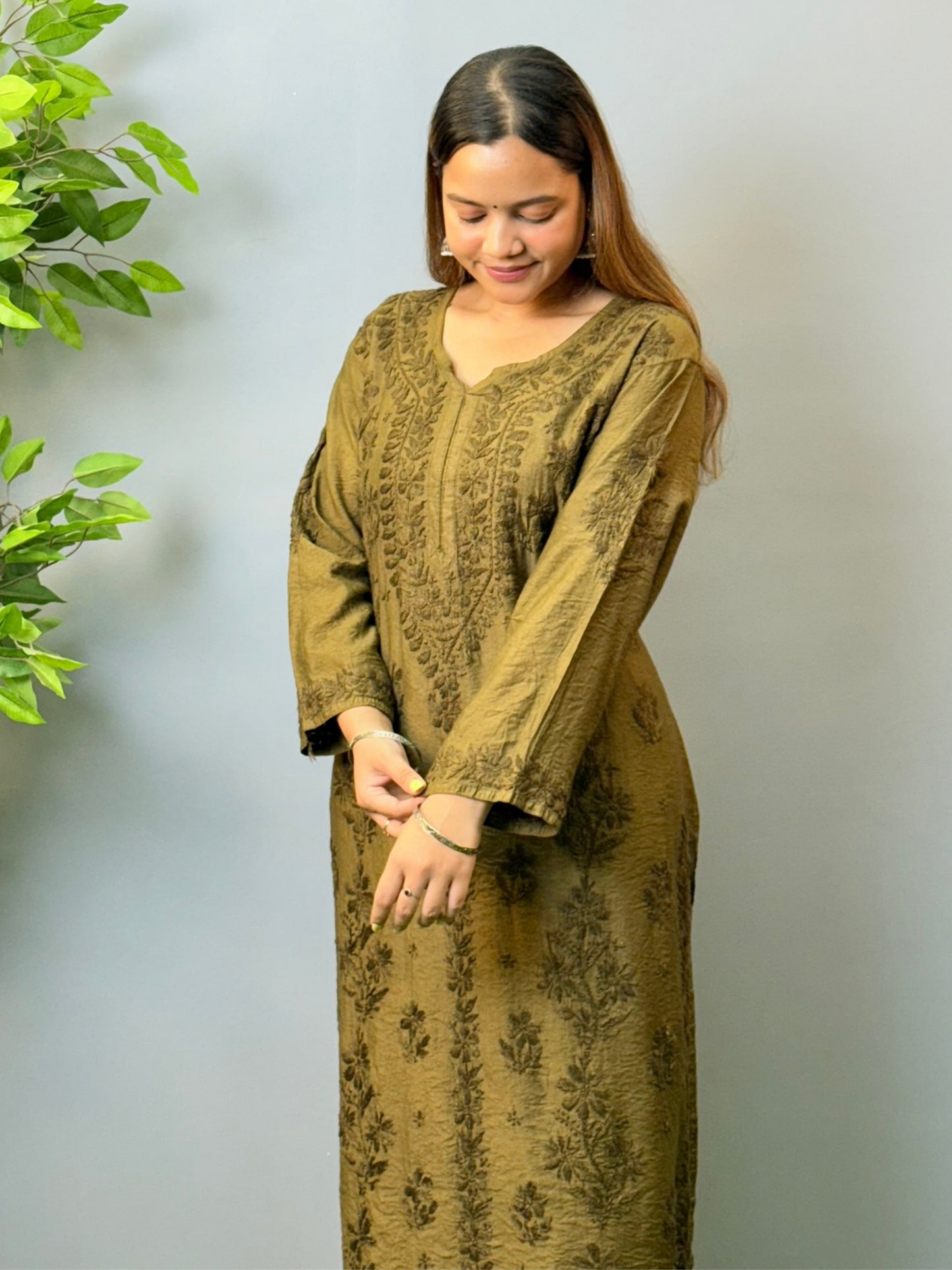 Woman wearing olive brown chanderi chikankari kurta with tone-on-tone embroidery