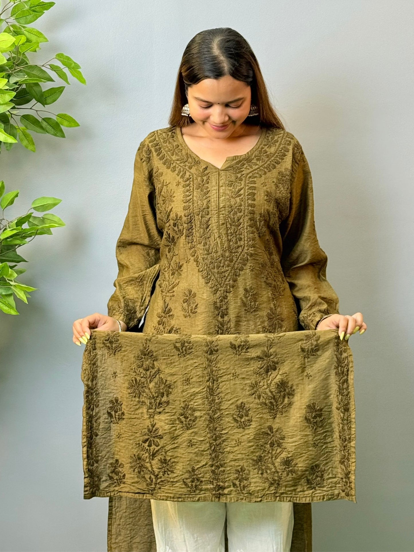 Woman wearing olive brown chanderi chikankari kurta with tone-on-tone embroidery