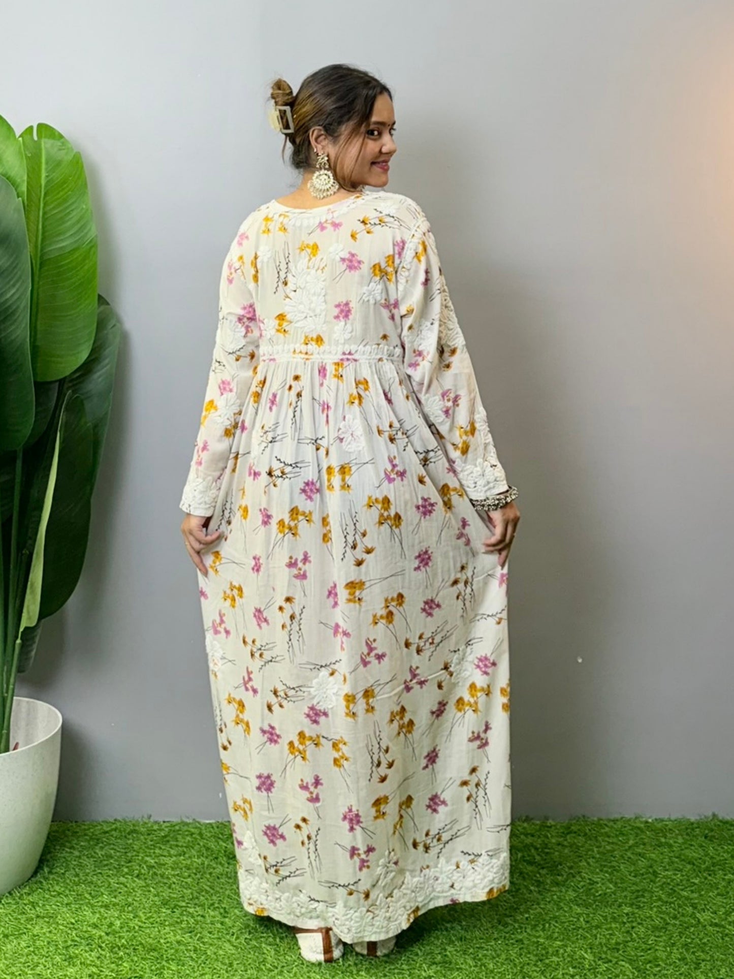 Floral printed mulmul Chikankari frock with 3D hand embroidery in off-white, pink, and yellow tones