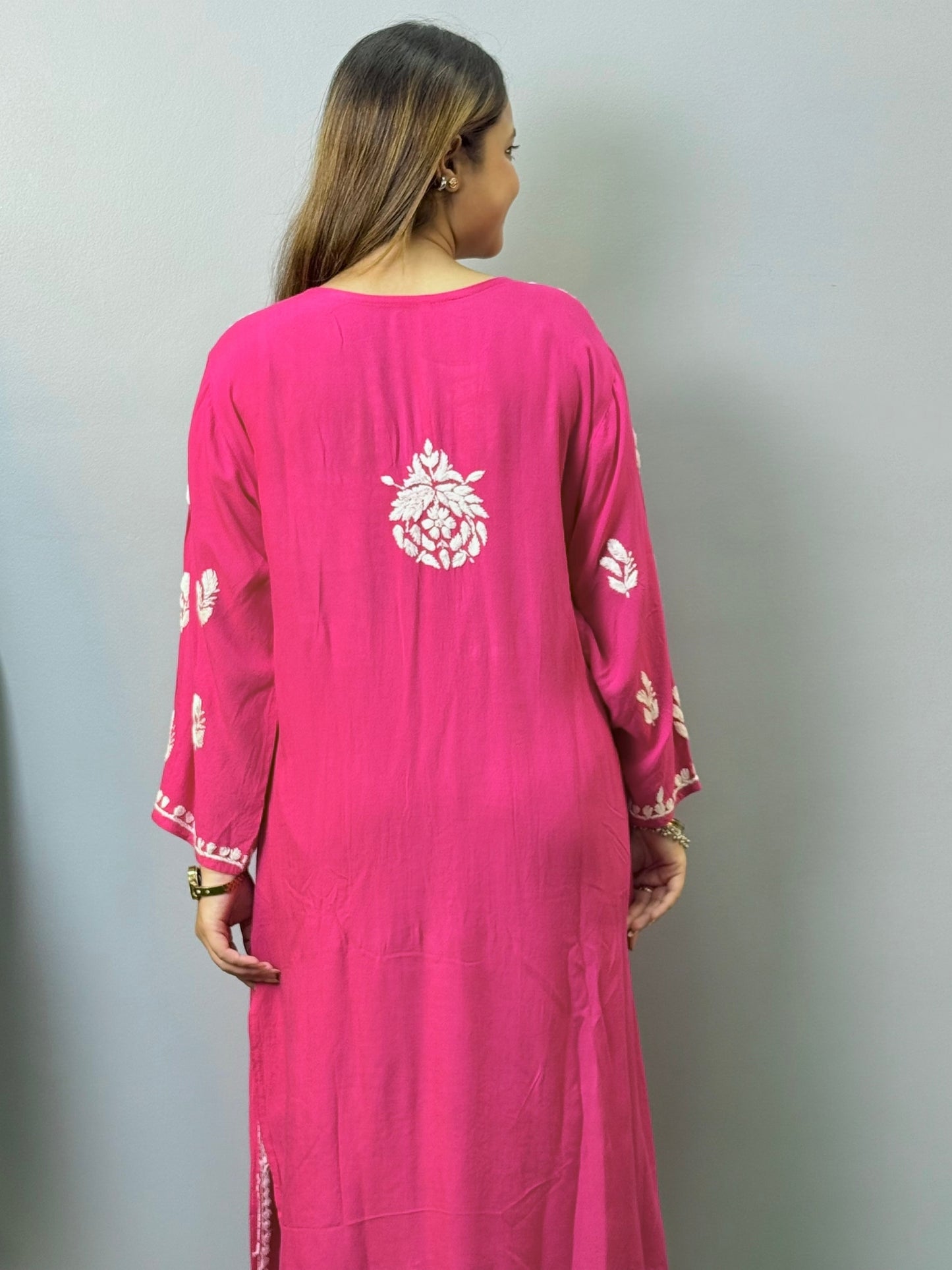 Rani pink rayon Lucknow Chikankari kurta with white hand embroidery and matching palazzo set