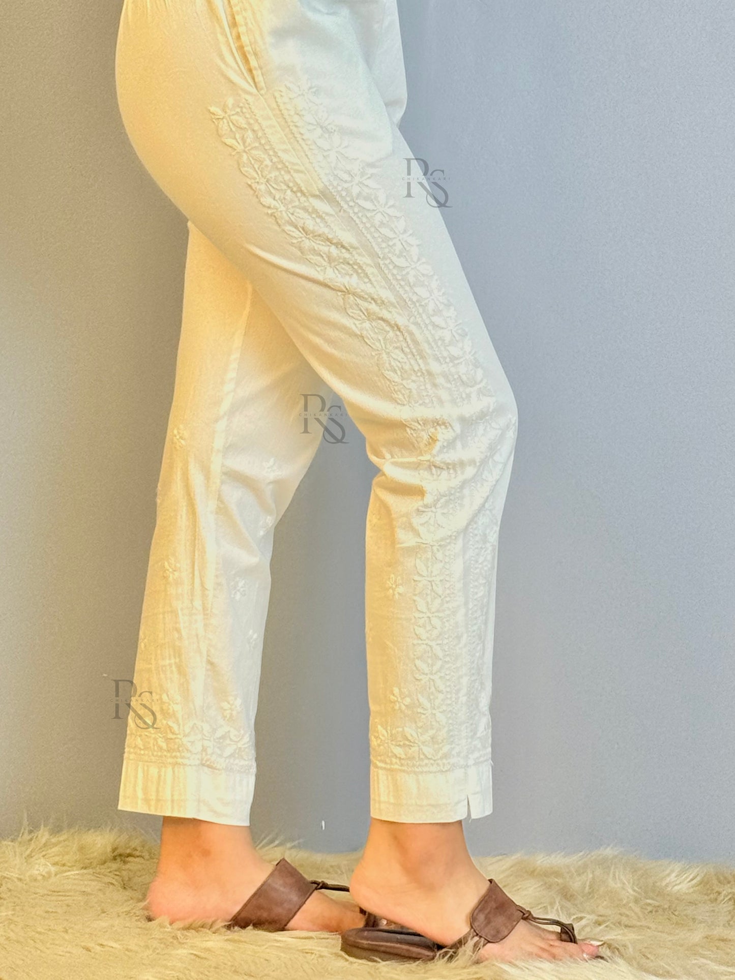Stretchable white cotton pant with heavy side Chikankari hand embroidery