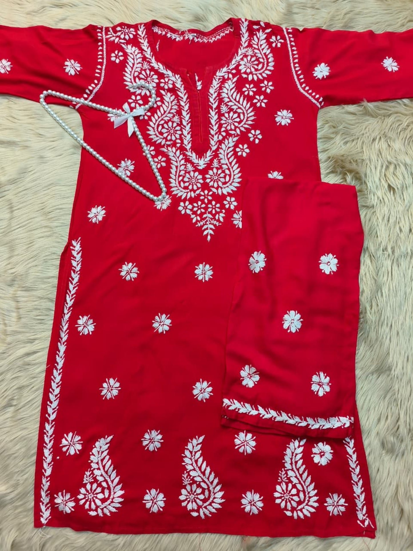 Red rayon Lucknow Chikankari kurta and palazzo set with white hand embroidery in floral and paisley motifs