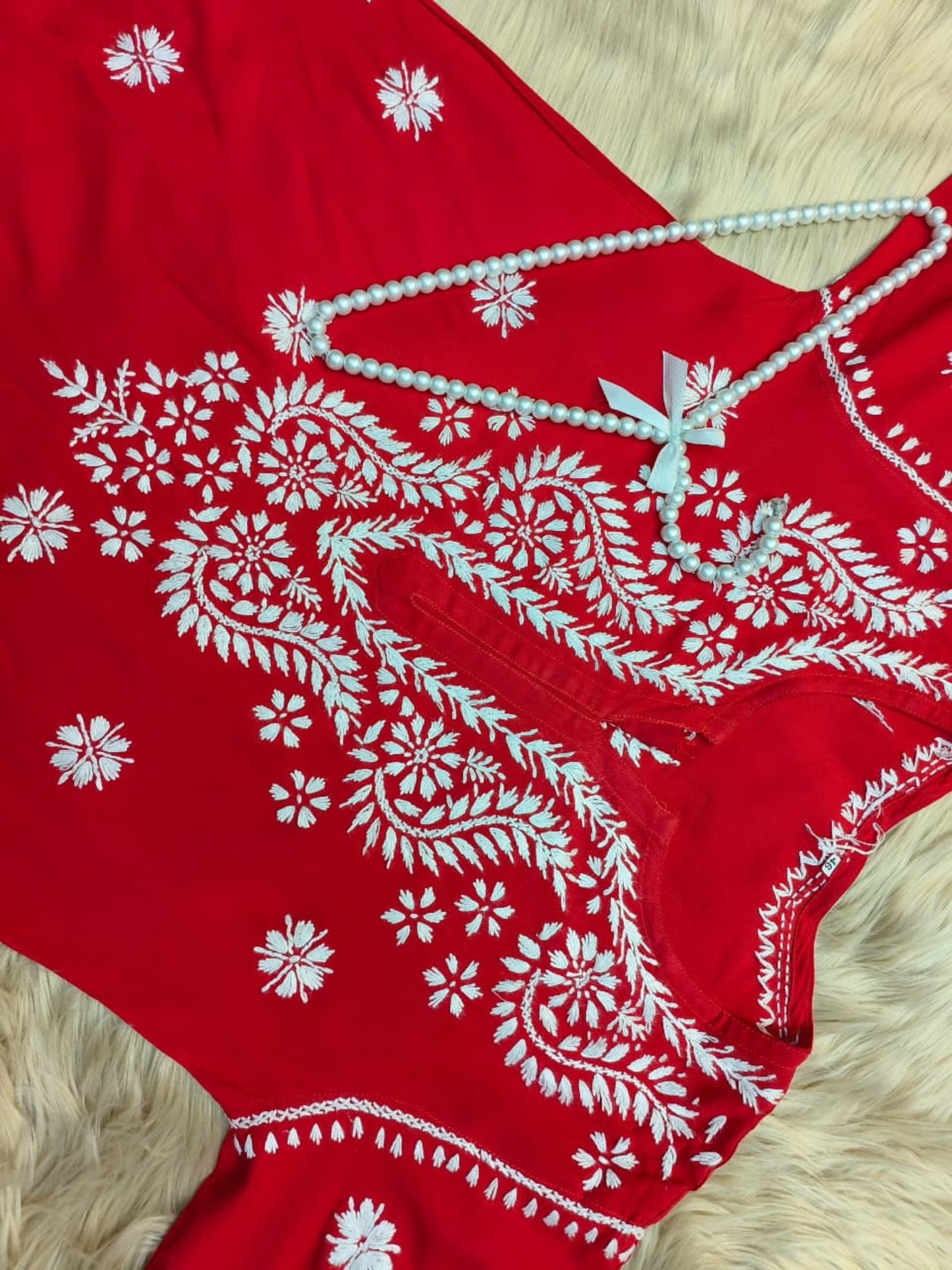 Red rayon Lucknow Chikankari kurta and palazzo set with white hand embroidery in floral and paisley motifs