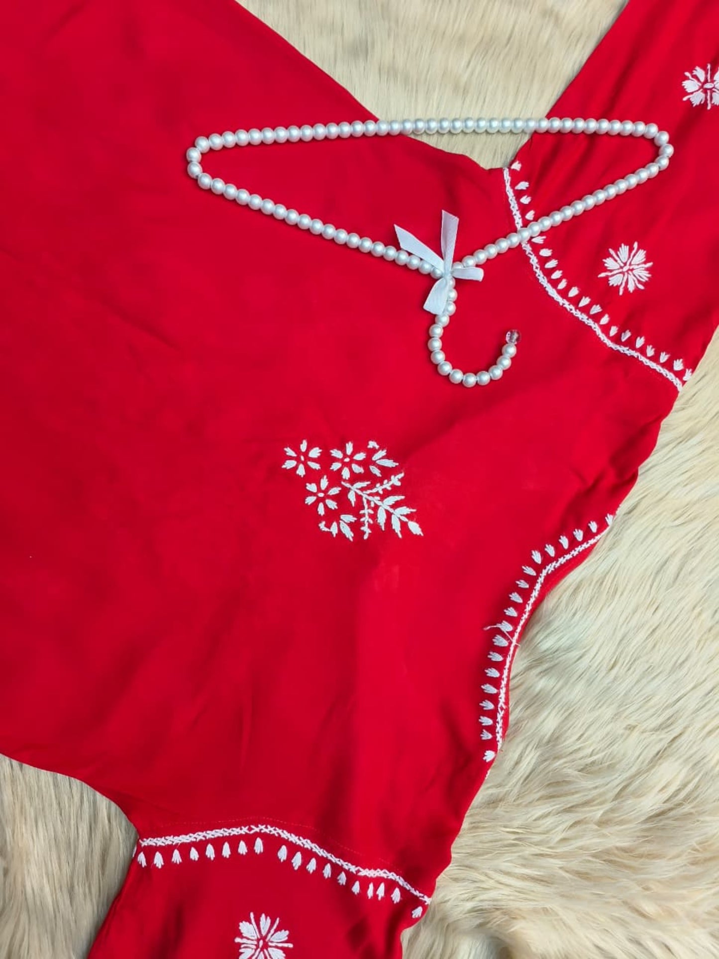 Red rayon Lucknow Chikankari kurta and palazzo set with white hand embroidery in floral and paisley motifs