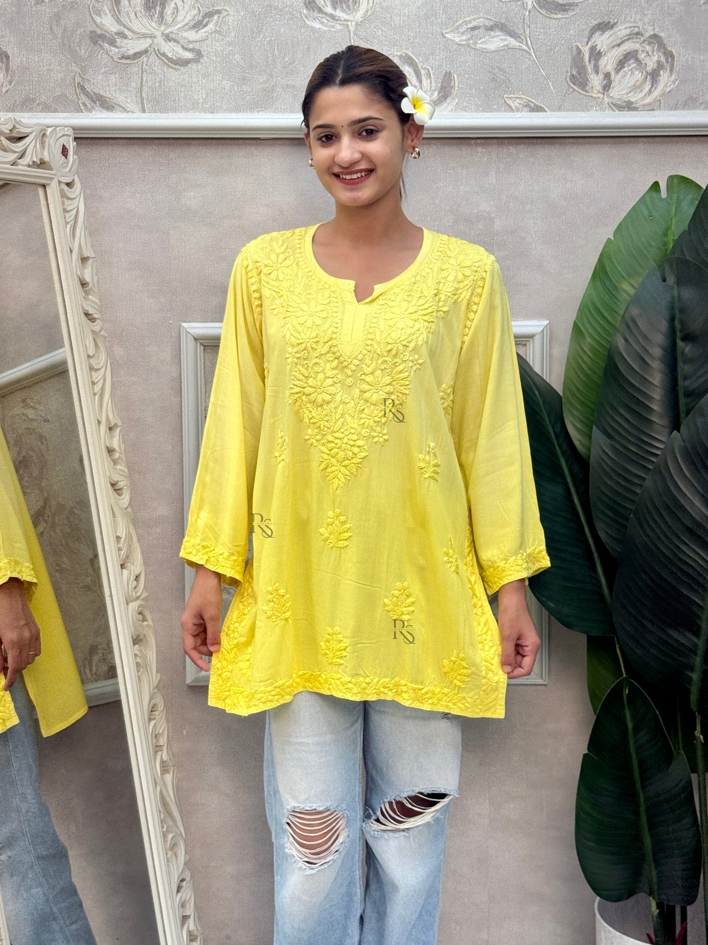 Sunshine yellow Lucknow Chikankari rayon short kurta with hand embroidery.