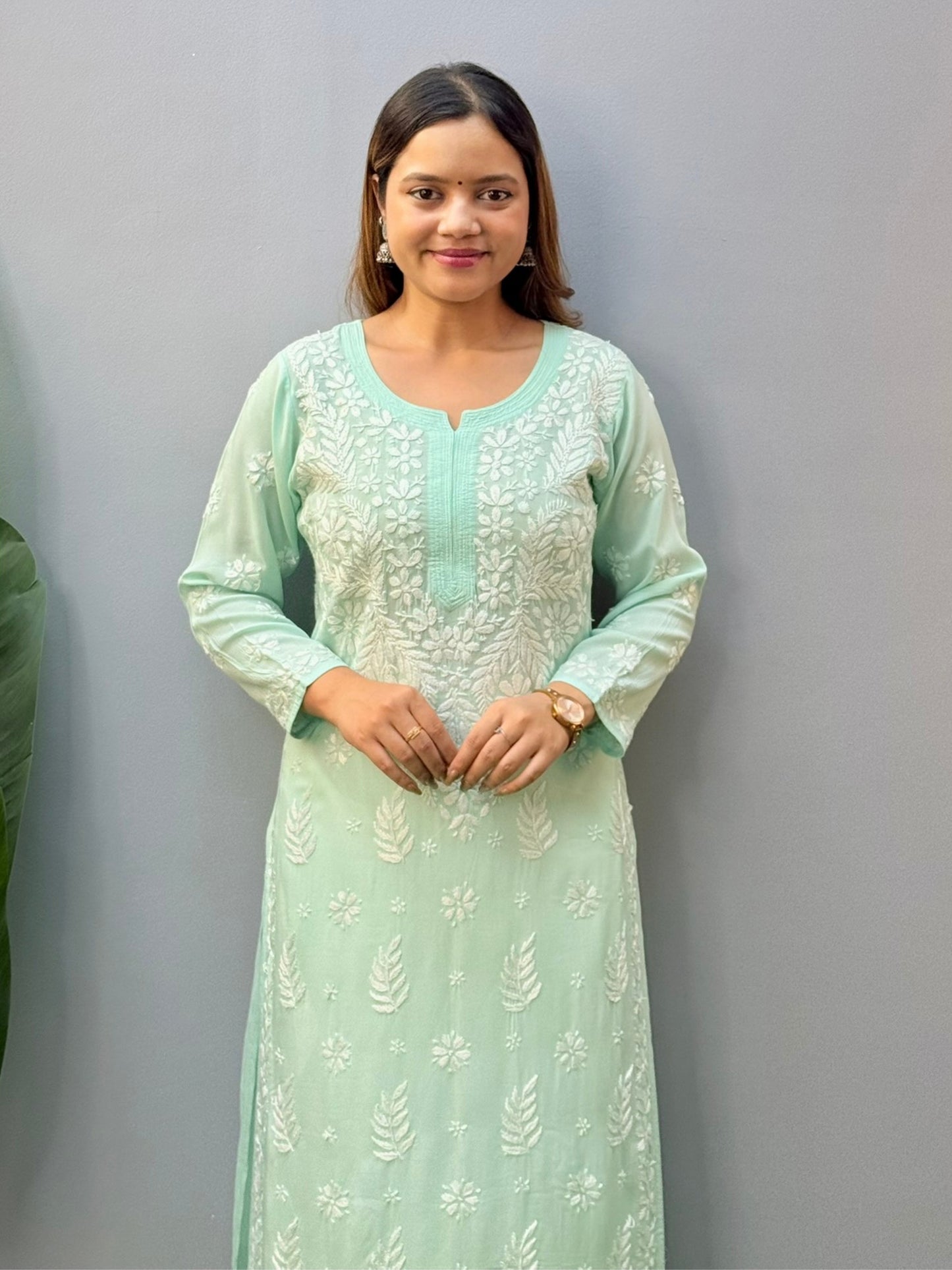 Mint green modal fabric chikankari kurta with white floral hand embroidery, straight long kurti for women
