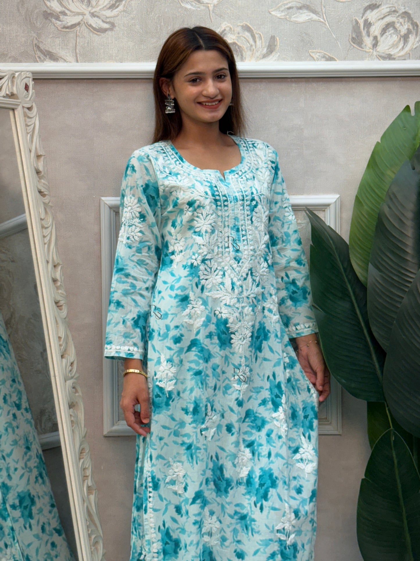 Aqua blue printed Lucknow Chikankari kurta and palazzo set in mulmul fabric with hand embroidery