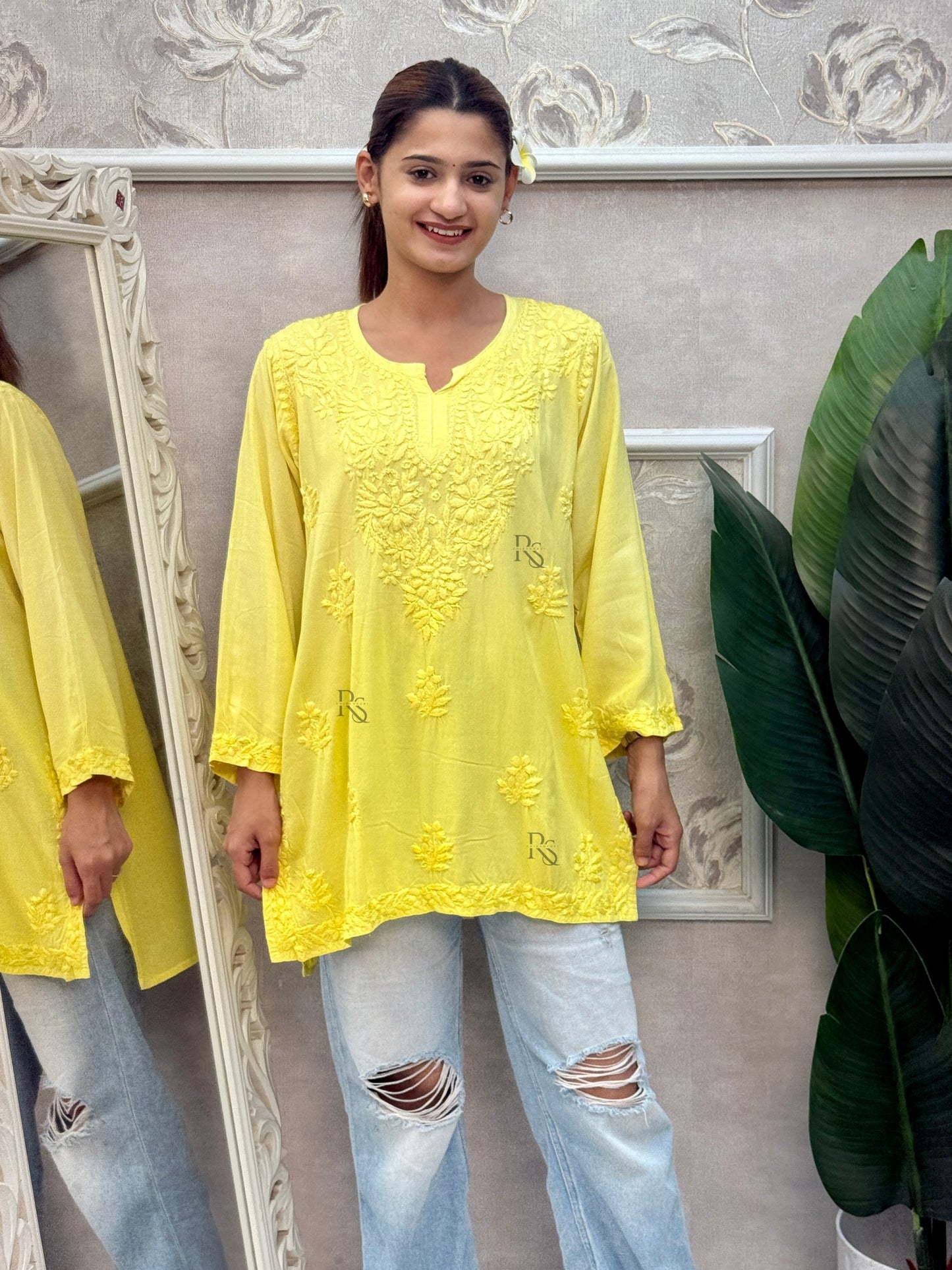 Sunshine yellow Lucknow Chikankari rayon short kurta with hand embroidery.