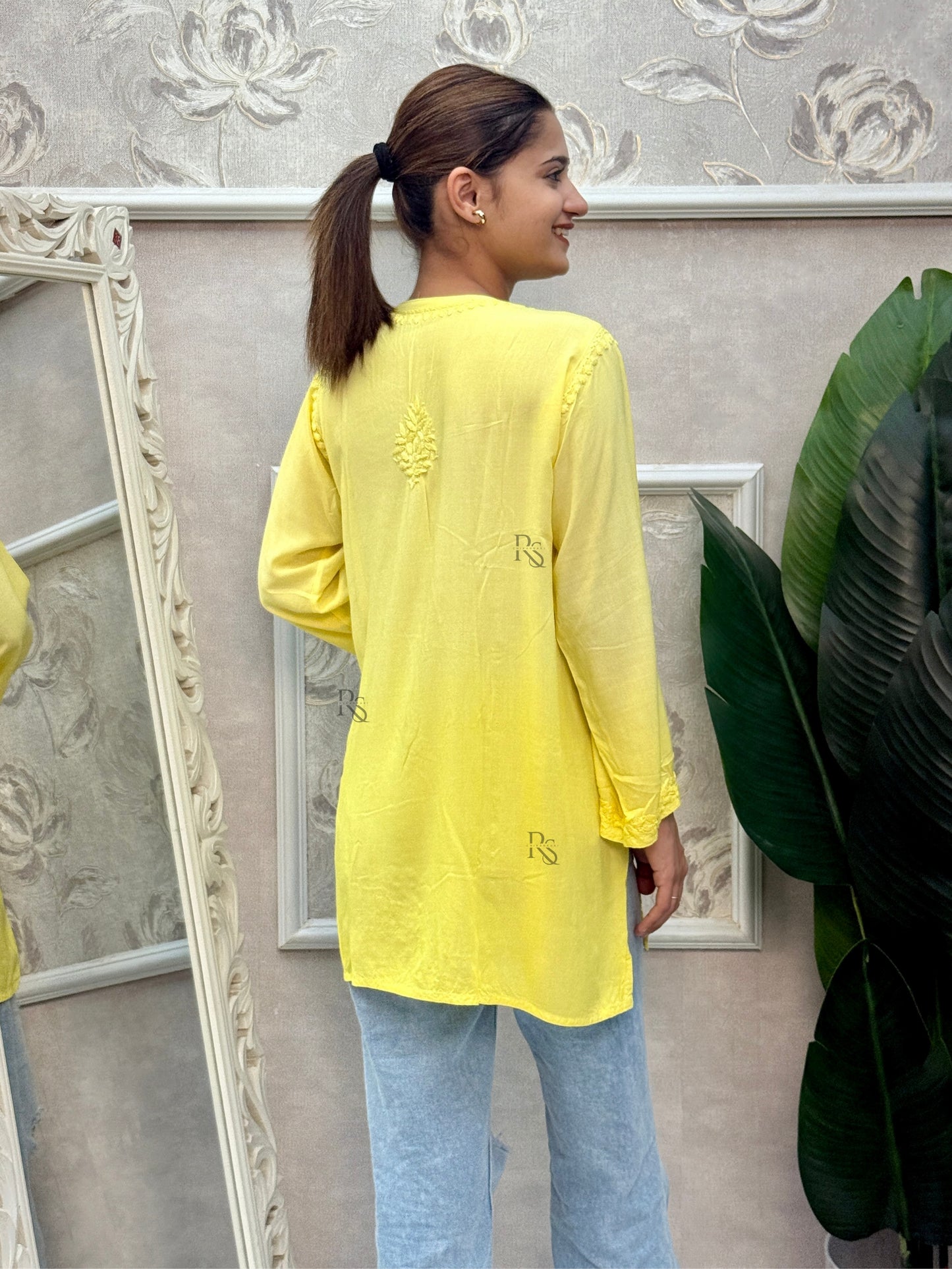 Sunshine yellow Lucknow Chikankari rayon short kurta with hand embroidery.