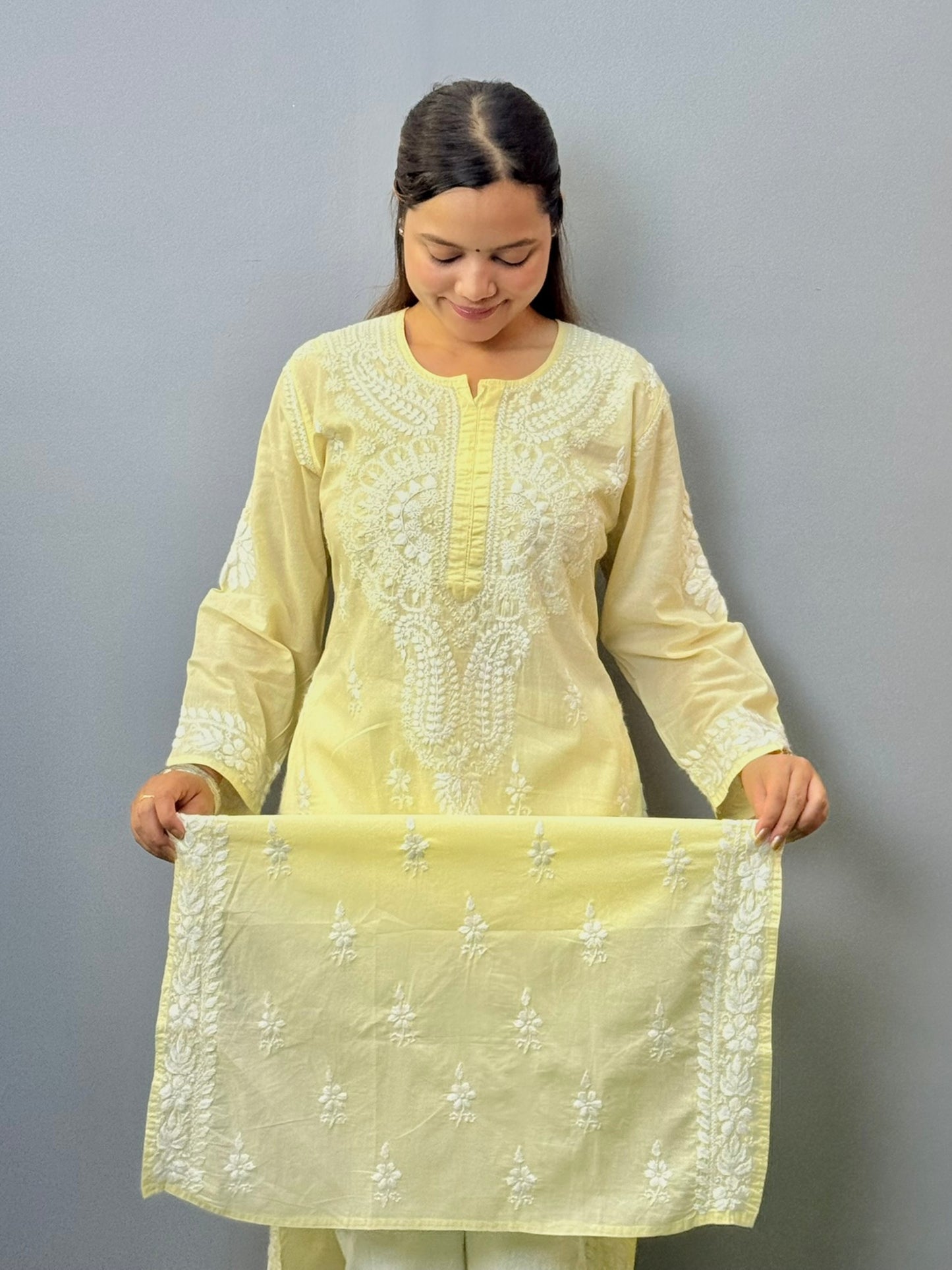 Pastel yellow cotton chikankari kurta with white thread hand embroidery