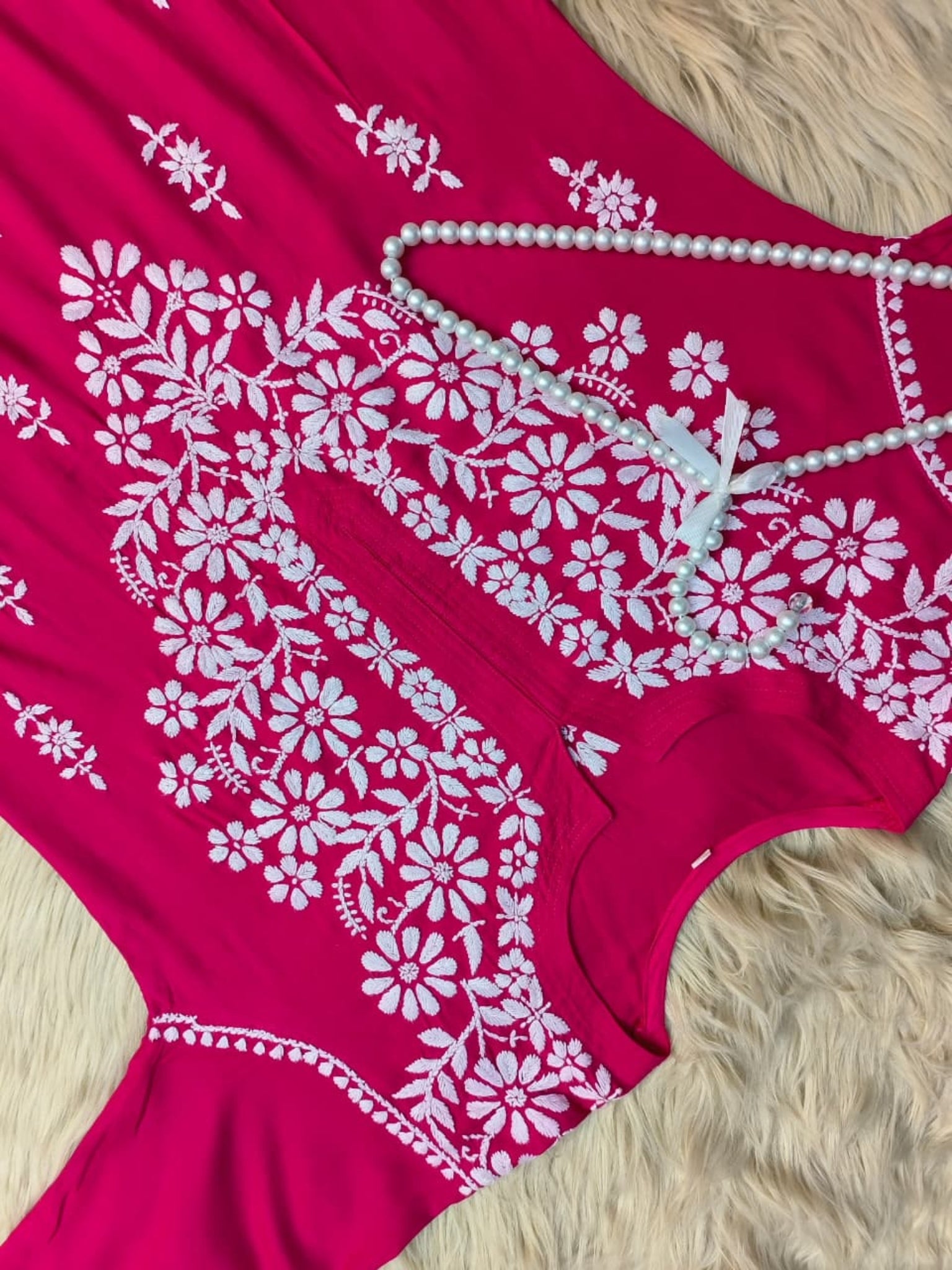 Rani pink rayon Lucknow Chikankari kurta with matching dhoti set, hand-embroidered and premium quality.