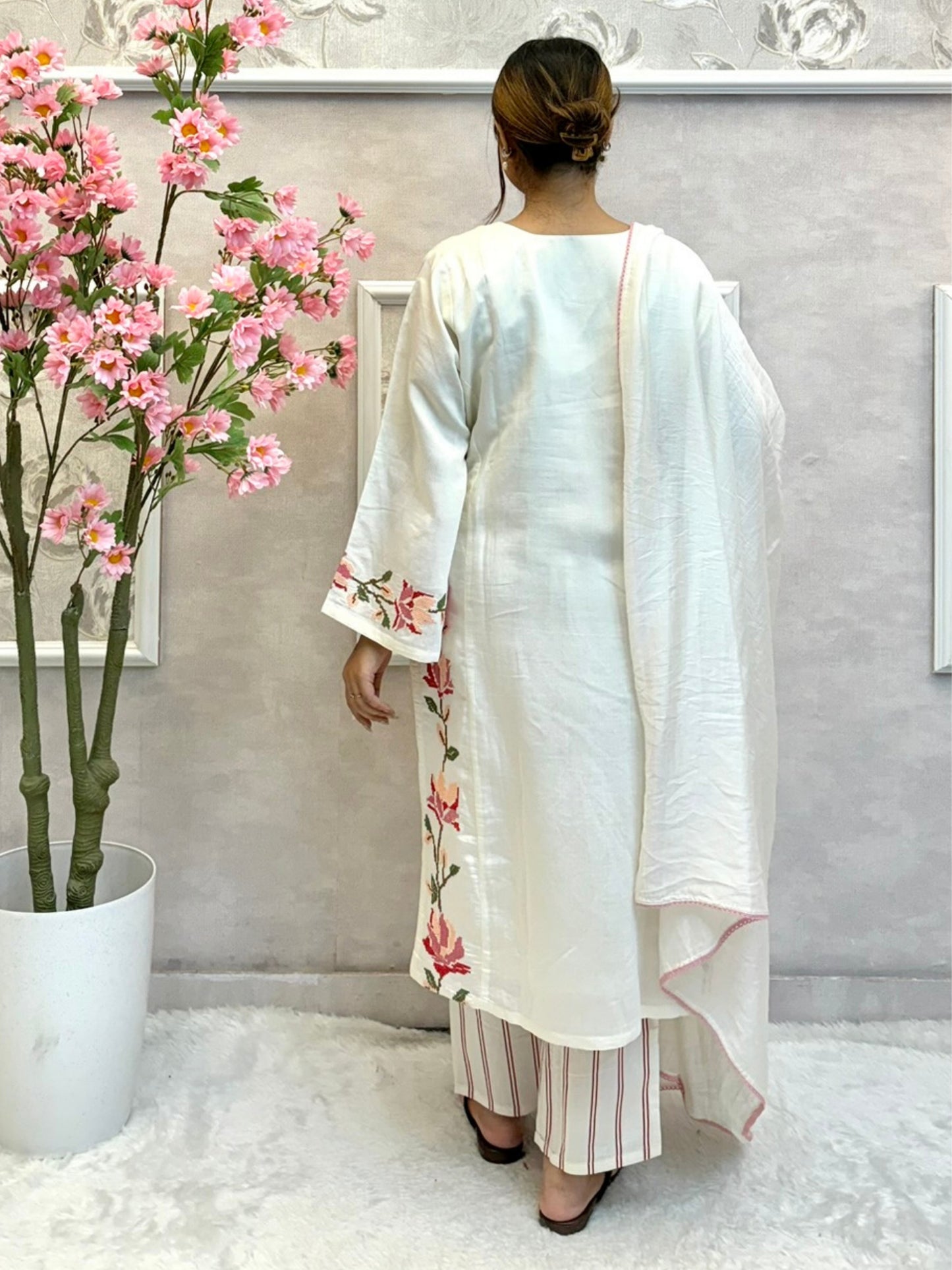 Off-white muslin kurta set with floral hand embroidery, striped pant, and chanderi dupatta – premium ethnic wear