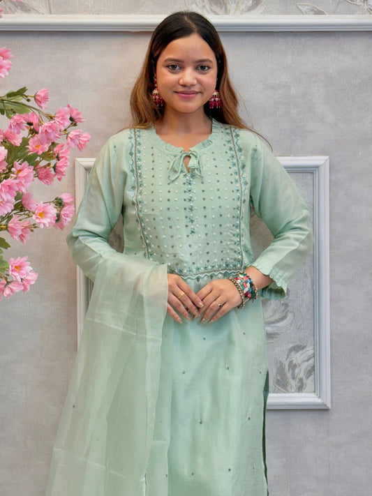 Model wearing a mint green chanderi hand-embroidered kurta set with organza dupatta β Designer Wear Collection.