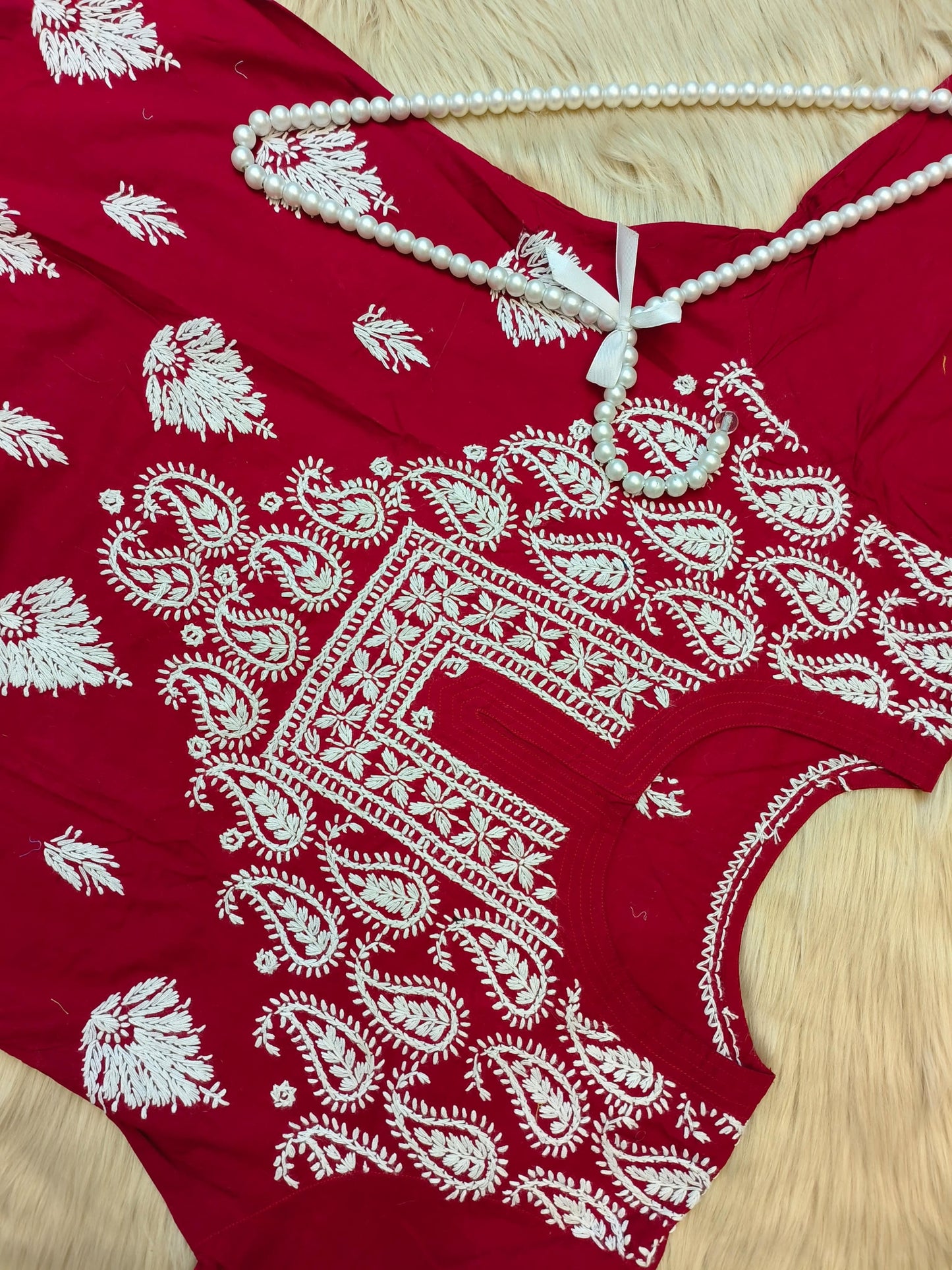 Maroon cotton chikankari kurta with white hand embroidery and paisley motifs