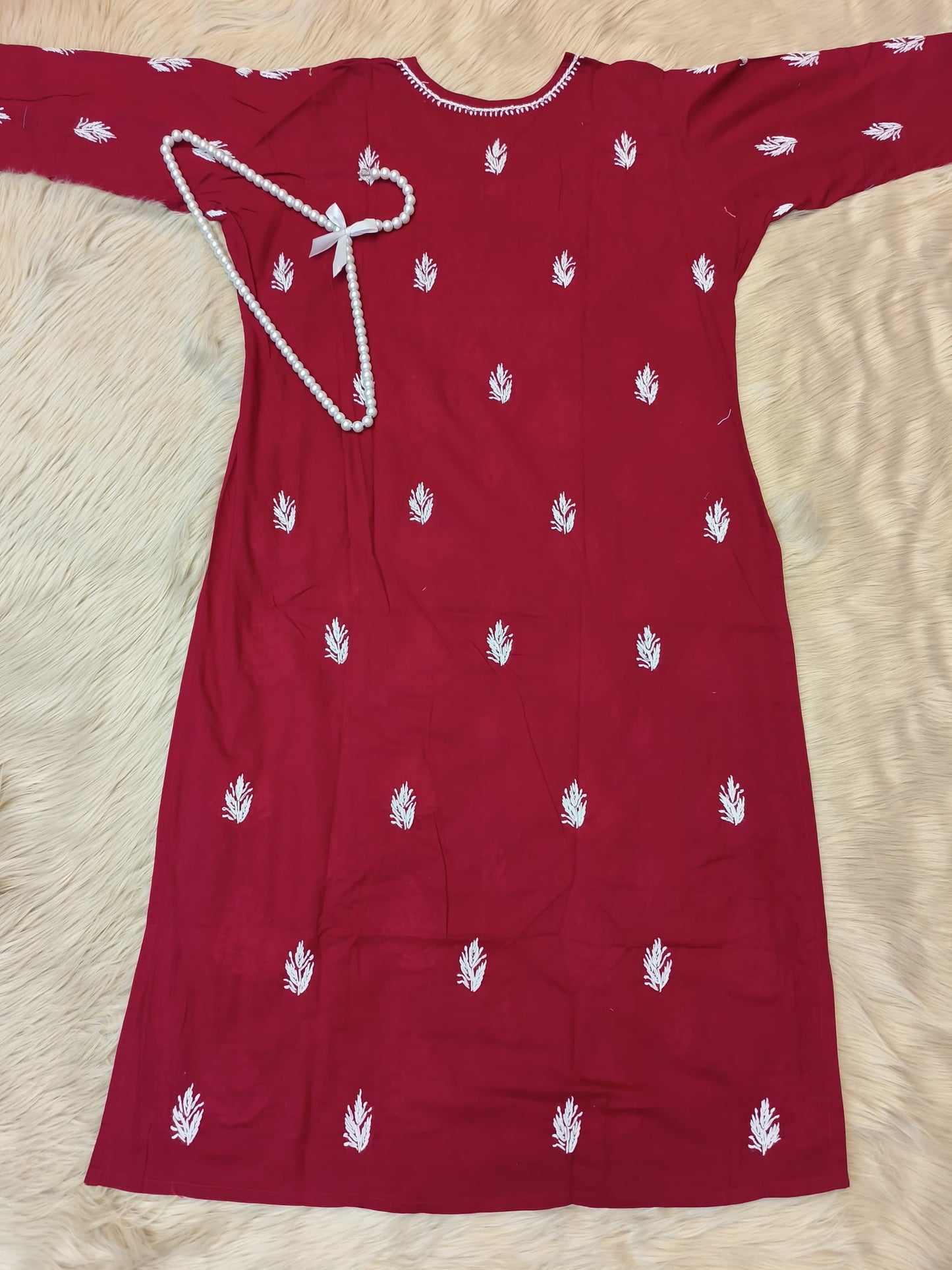 Maroon cotton chikankari kurta with white hand embroidery and paisley motifs