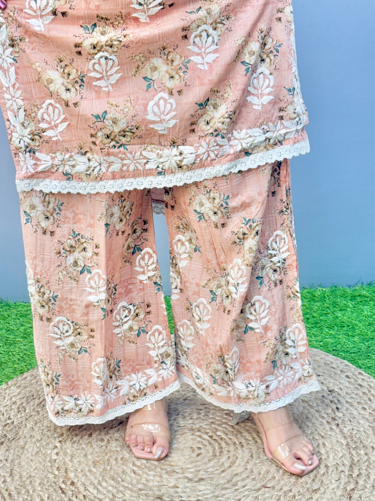 Warm peach printed Lucknow Chikankari mulmul kurta palazzo set with lace detailing