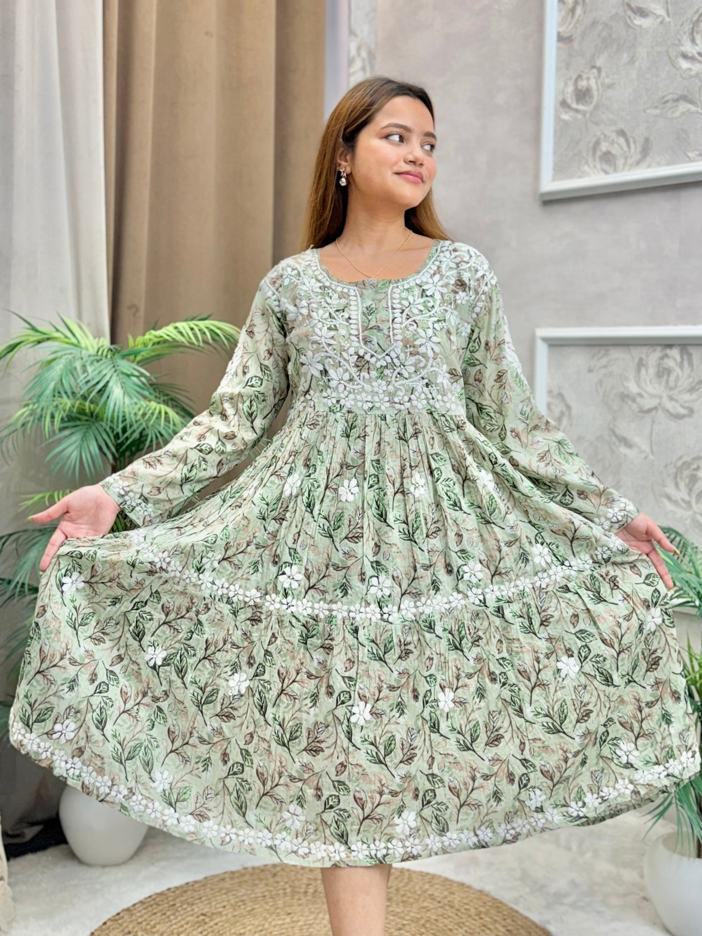 Sage green printed mulmul frock kurta with flared silhouette and Lucknow Chikankari embroidery