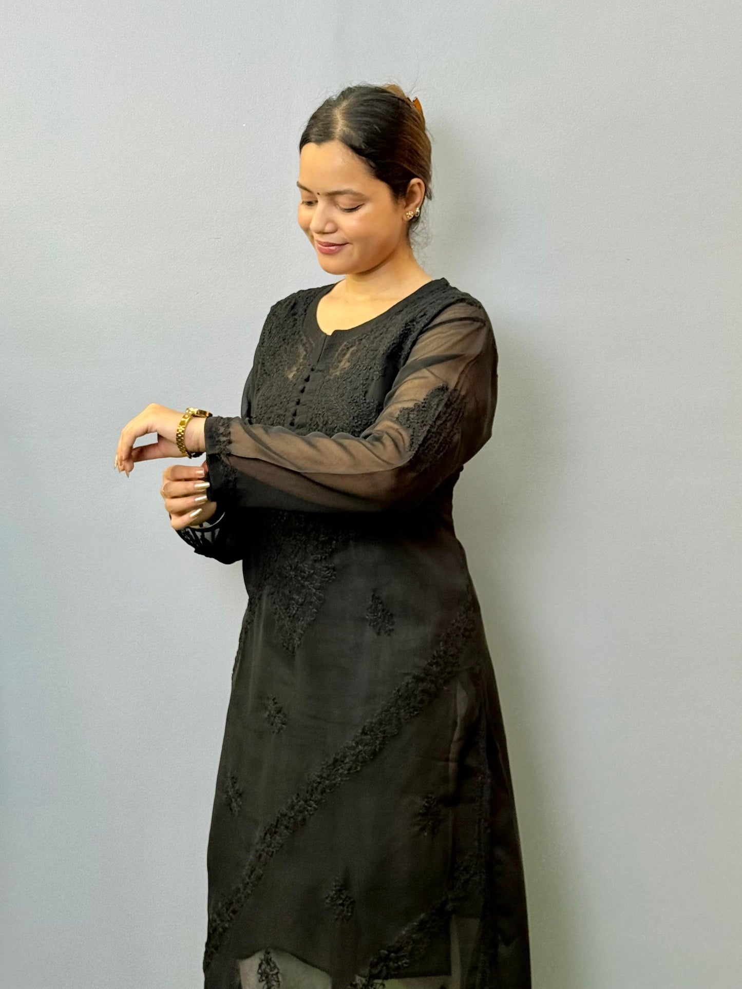 Black sheer georgette chikankari kurta with hand embroidery and straight fit