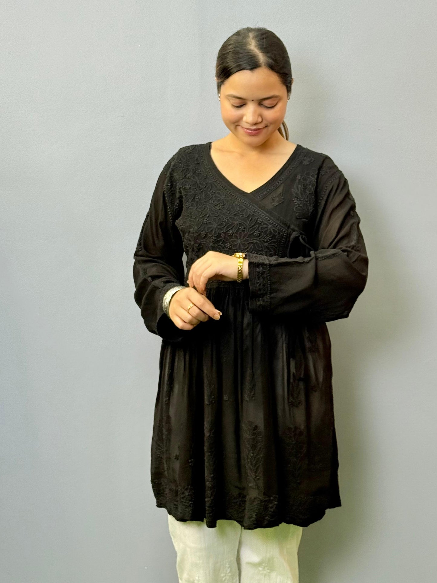 Black Lucknow chikankari short kurta with angrakha pattern in viscose transy fabric