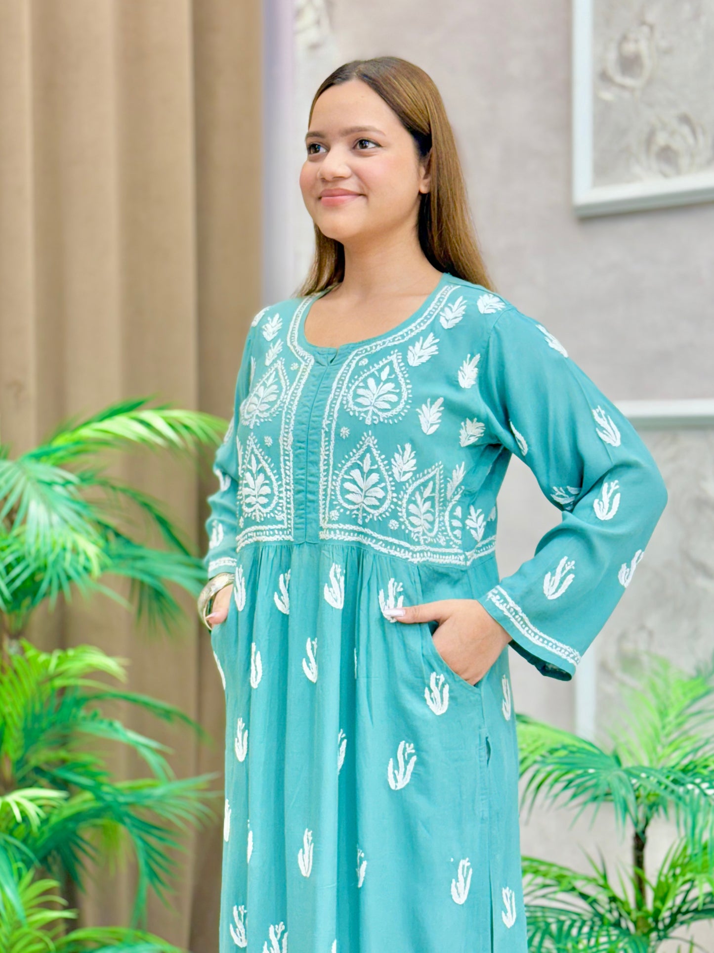 Aqua blue modal knee-length Lucknow Chikankari kurta with both-side pockets and hand embroidery