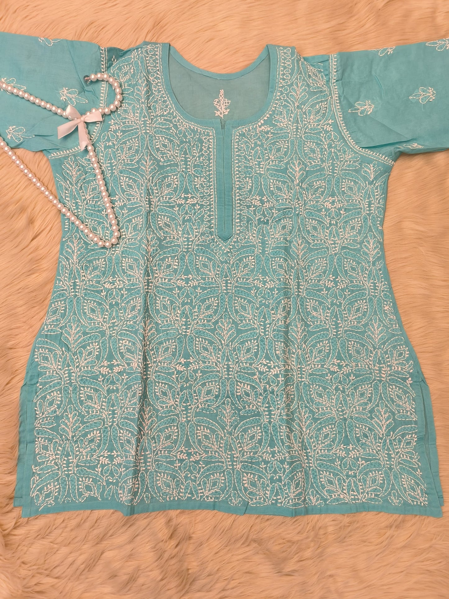 Sea green short voile cotton chikankari kurta with white hand embroidery and bakhiya work