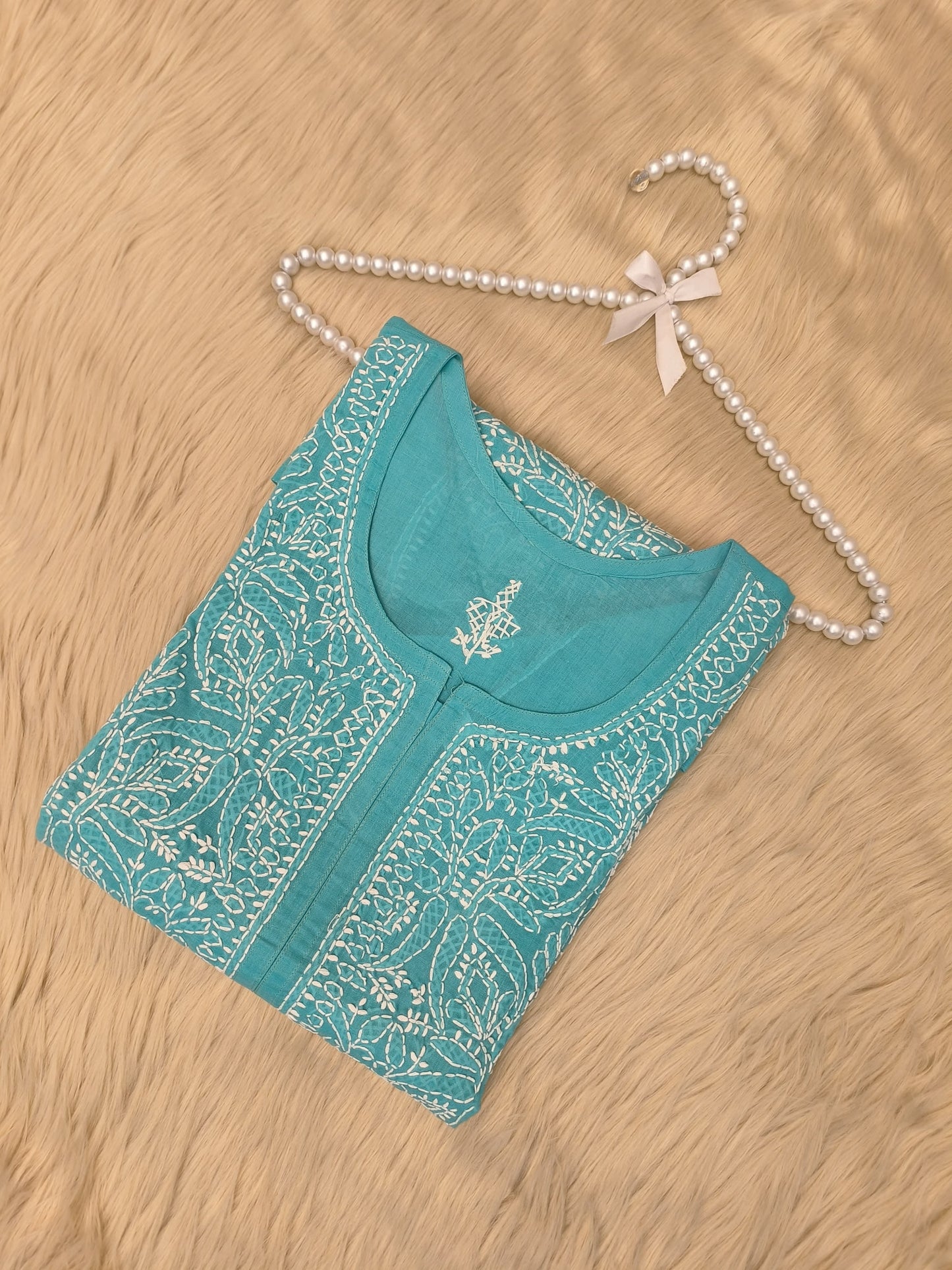 Sea green short voile cotton chikankari kurta with white hand embroidery and bakhiya work