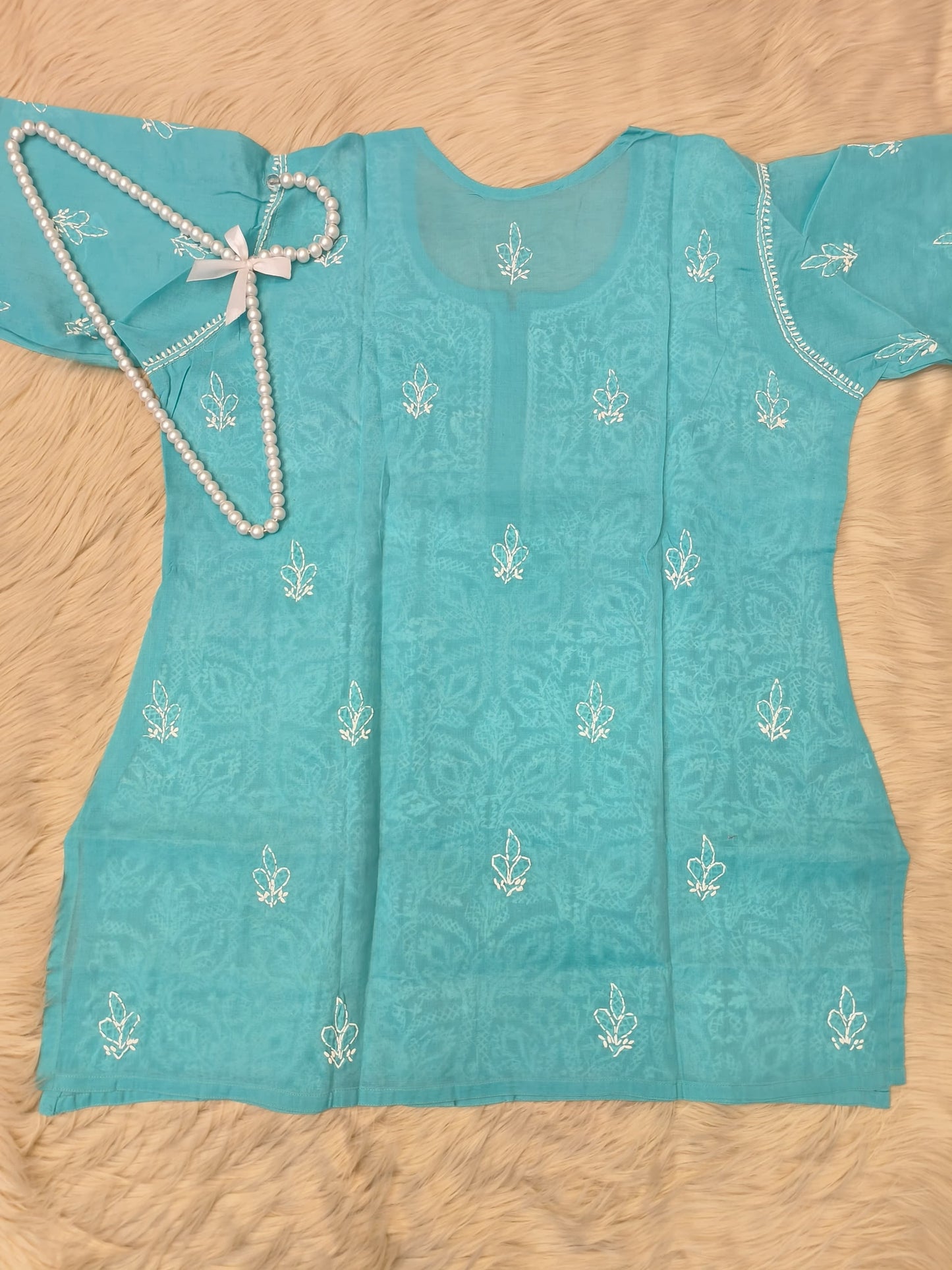 Sea green short voile cotton chikankari kurta with white hand embroidery and bakhiya work