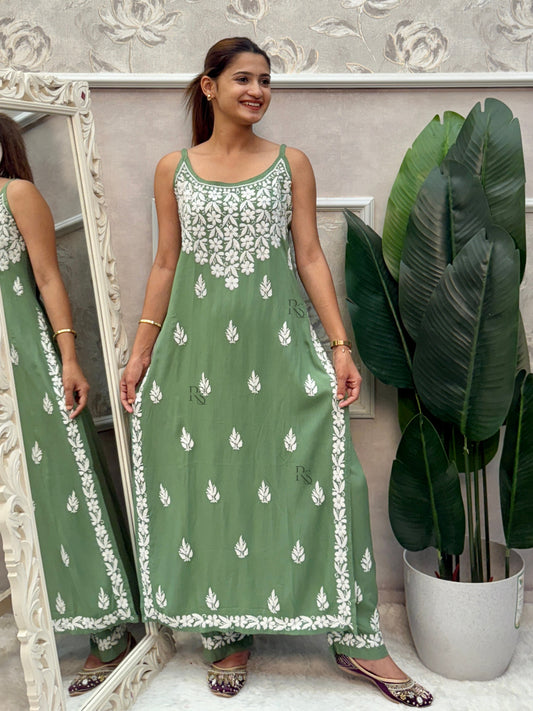 Sage green sleeveless Lucknow Chikankari rayon kurta and pant set with white hand embroidery.