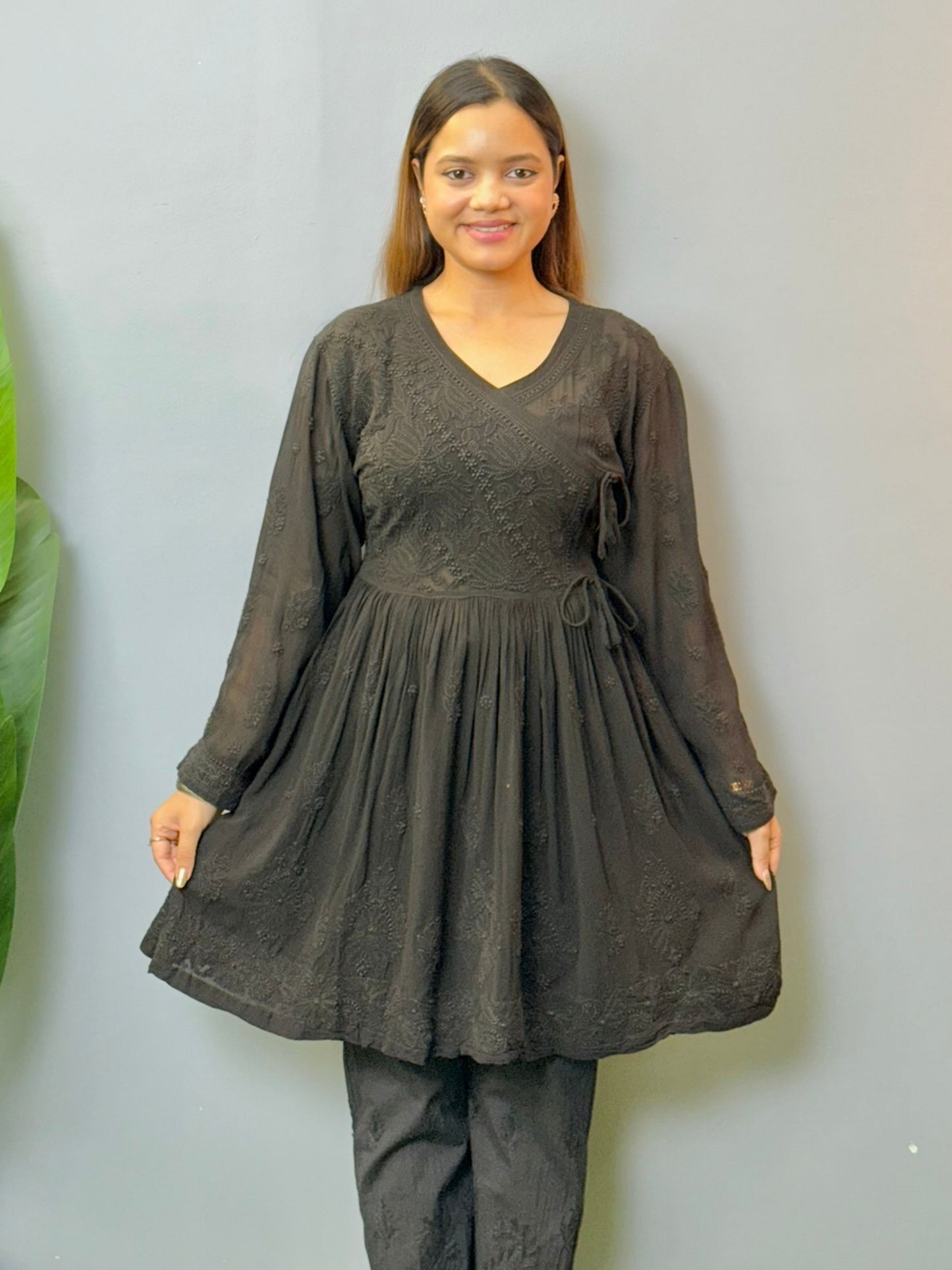 Black angrakha style short chikankari kurta in viscose fabric