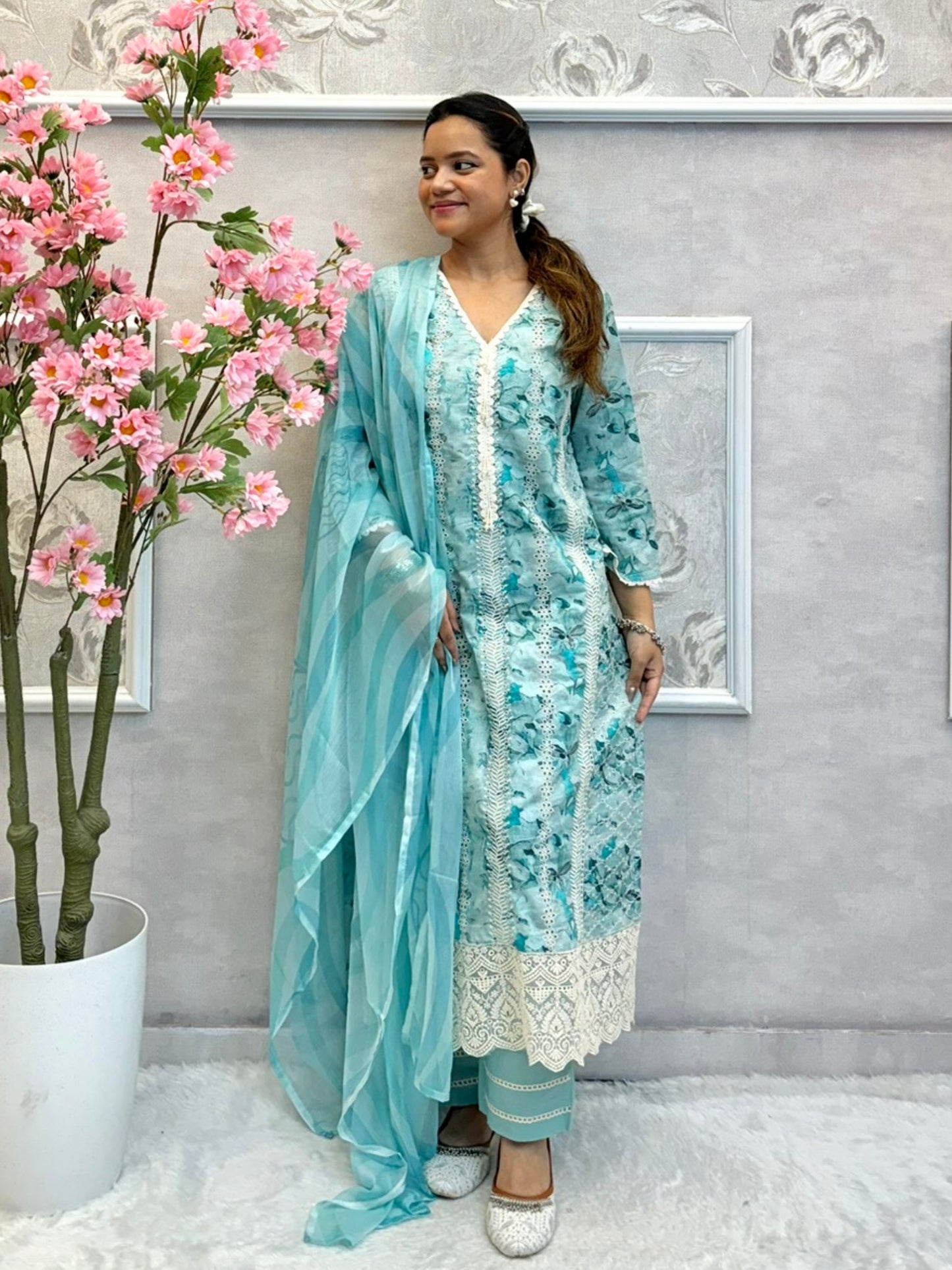 Aqua blue mulmul cotton kurta set with floral print, crochet lace, and chiffon dupatta