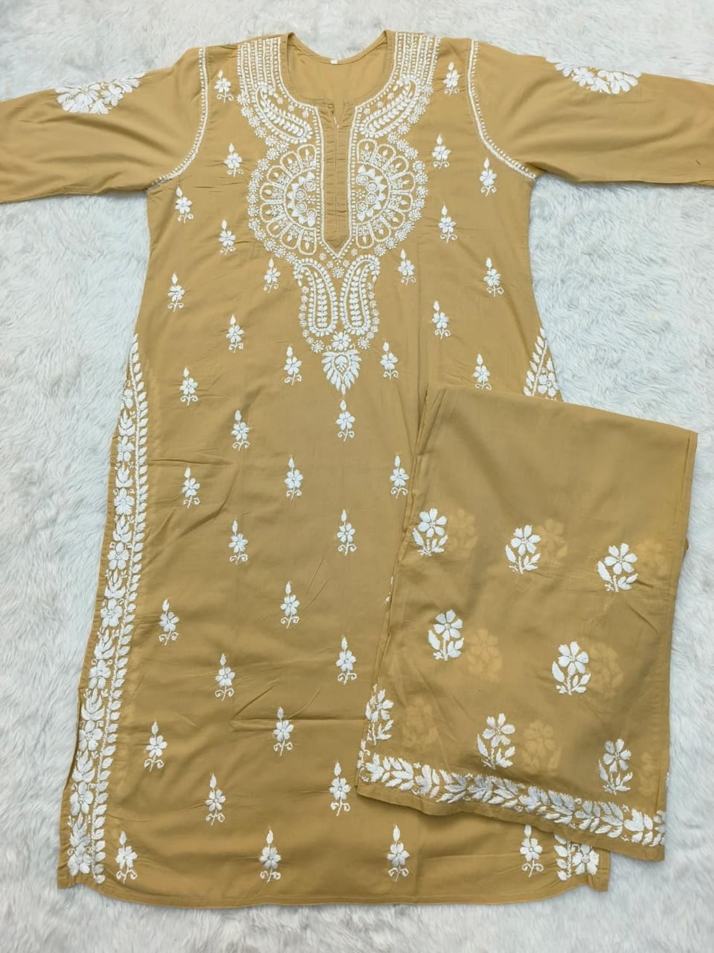 Camel brown cotton Lucknow Chikankari kurta with matching palazzo set, hand-embroidered in white thread.