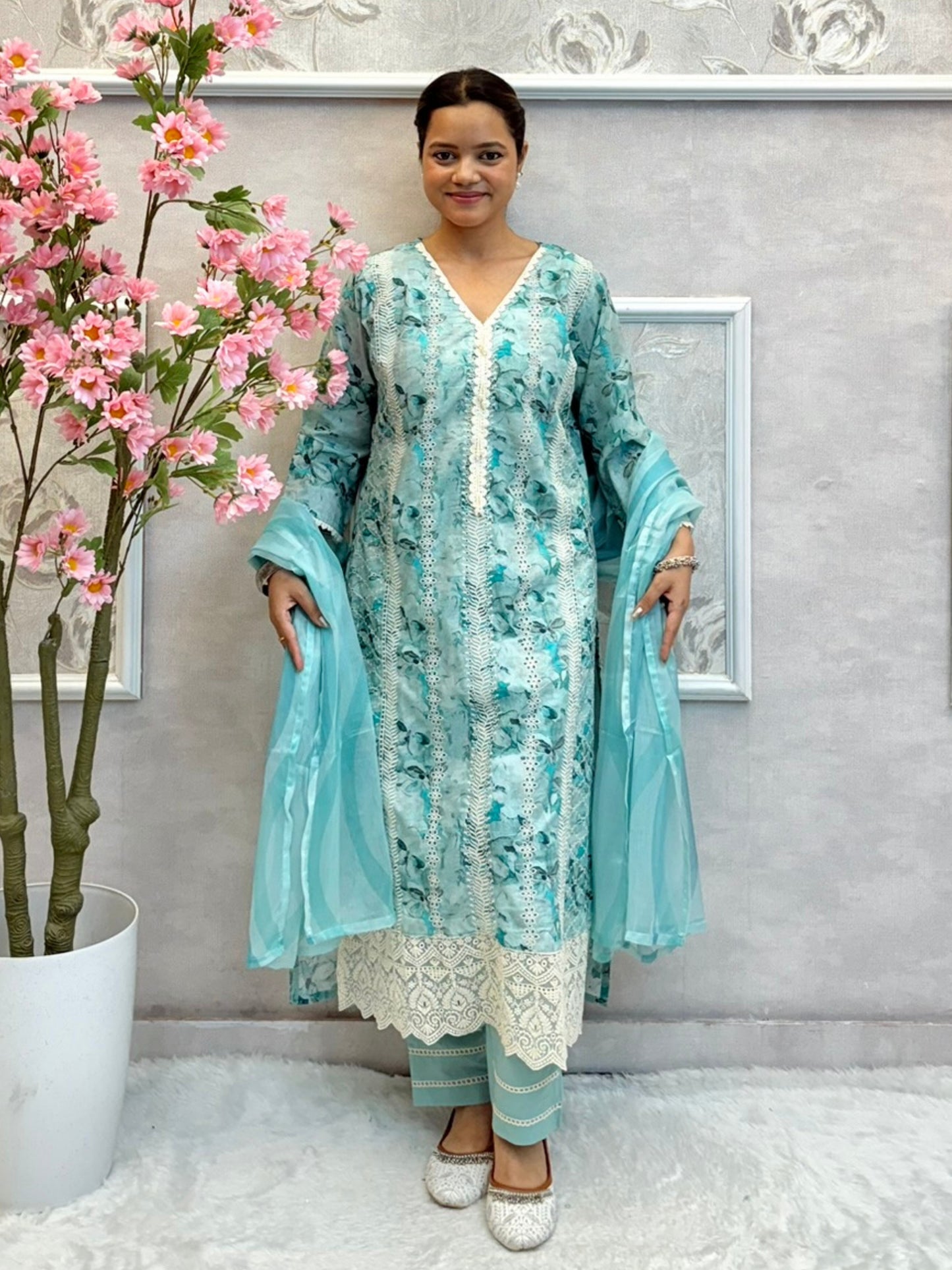 Aqua blue mulmul cotton kurta set with floral print, crochet lace, and chiffon dupatta