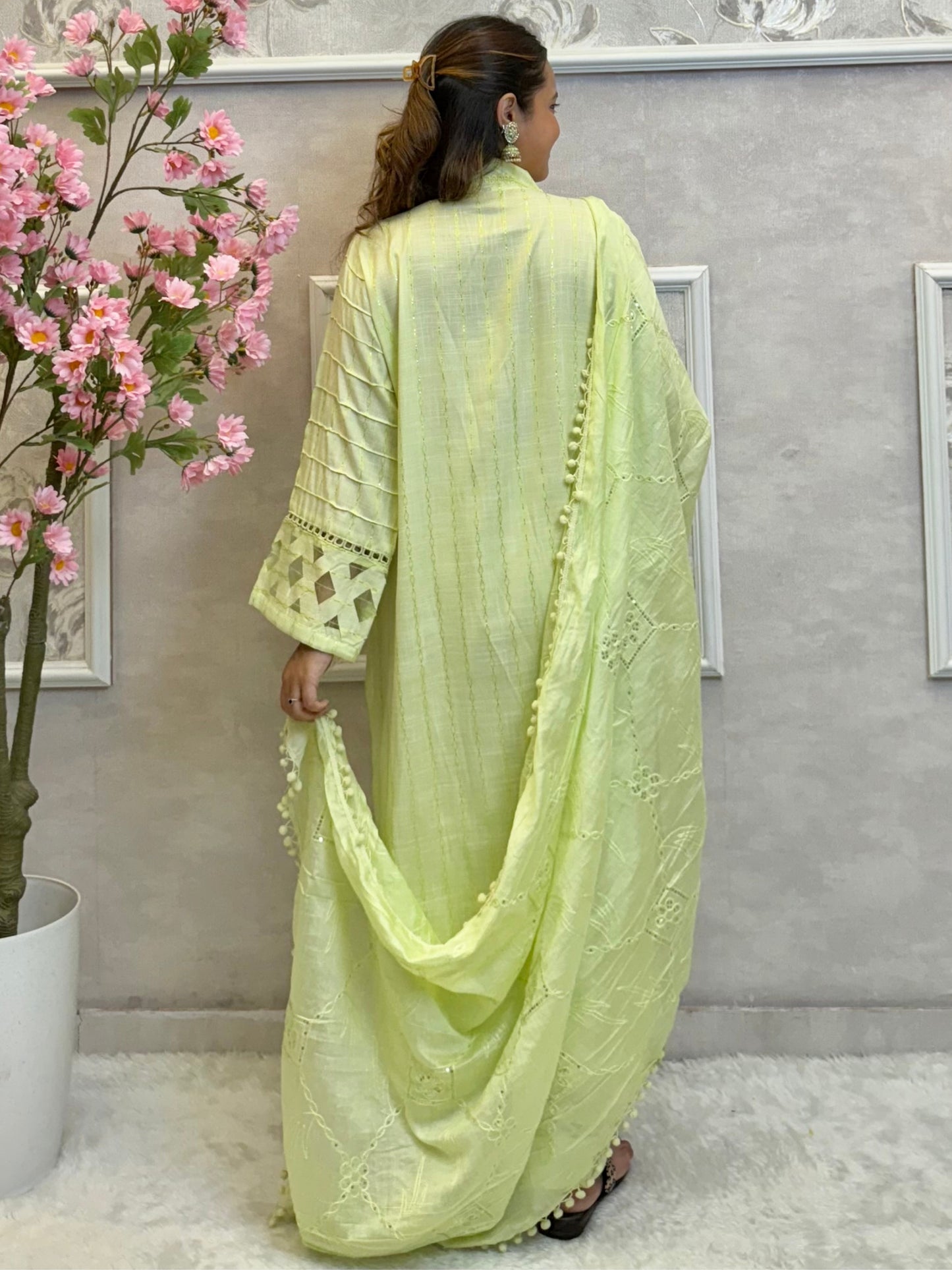 Model wearing a lime green rayon kurta with hand embroidery, paired with rayon pants and a chanderi dupatta – Designer Wear Collection.