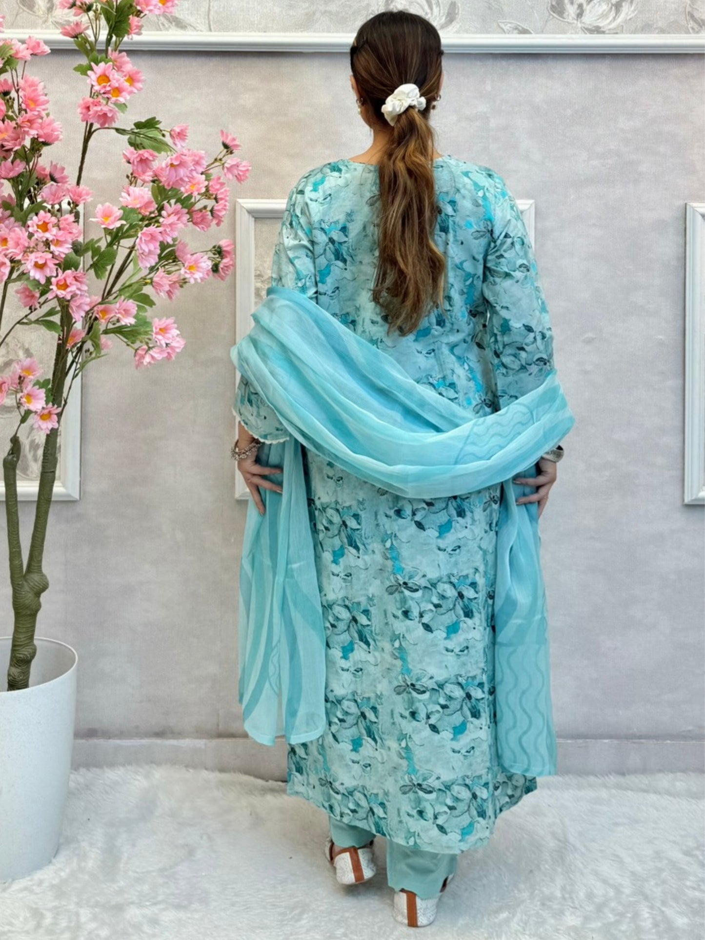Aqua blue mulmul cotton kurta set with floral print, crochet lace, and chiffon dupatta