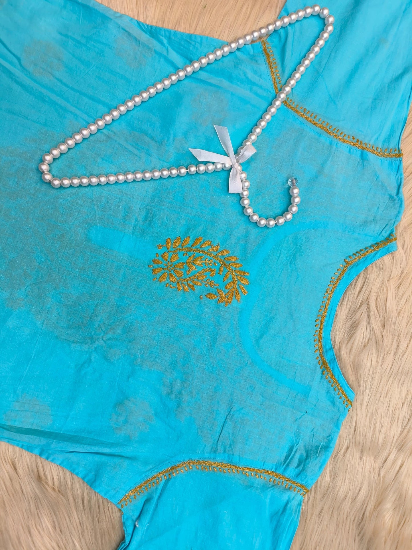Sky blue cotton chikankari kurta with mustard hand embroidery, ideal for casual wear